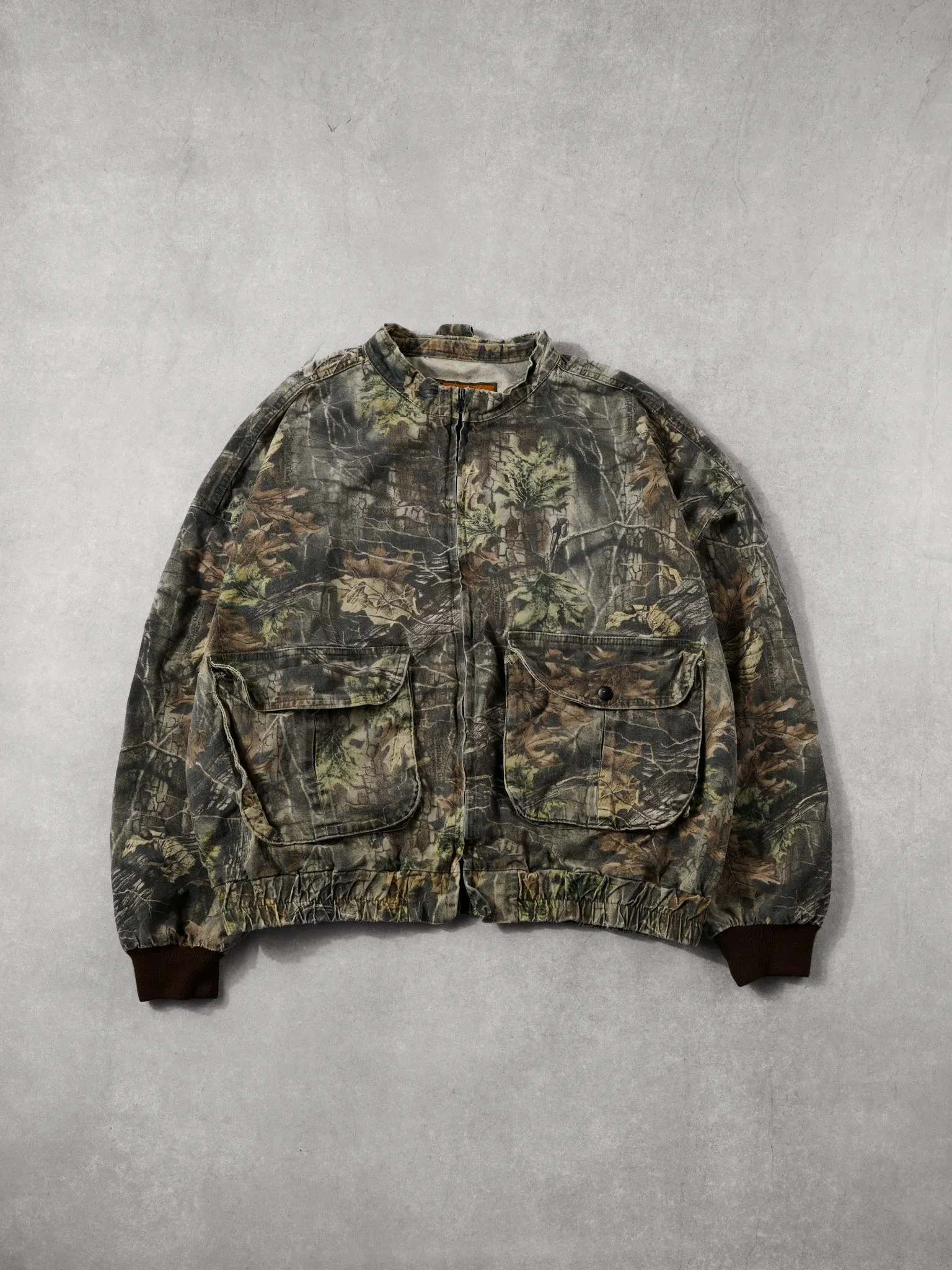 Vintage 90s Realtree America's Best Buy Tail Crest Camo Jacket (L/XL) sold by Rebalance Vintage