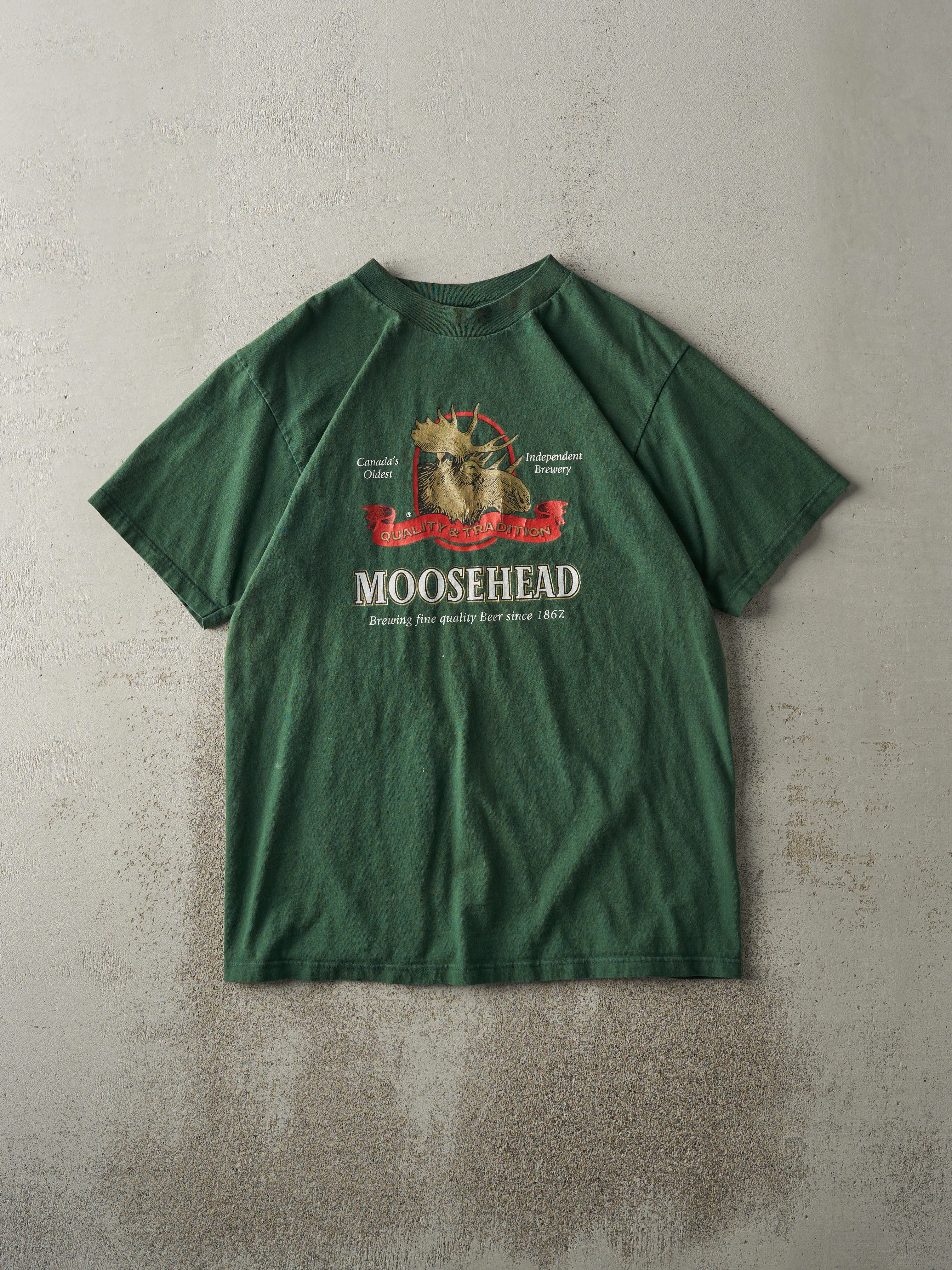 Vintage 90s Forest Green Moosehead Lager Tee (M) sold by Rebalance Vintage