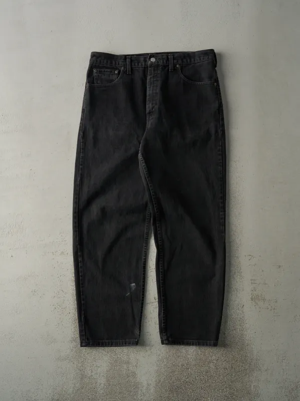 Vintage 90s Black Levi's 550 Denim Pants (34x30) sold by Rebalance Vintage