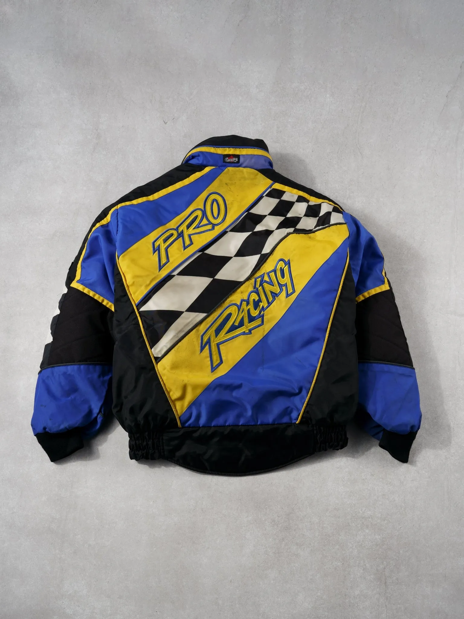 Vintage 90s Blue and Yellow Chako Racing Pro Insulated Racing Jacket (M) sold by Rebalance Vintage product image thumbnail 2