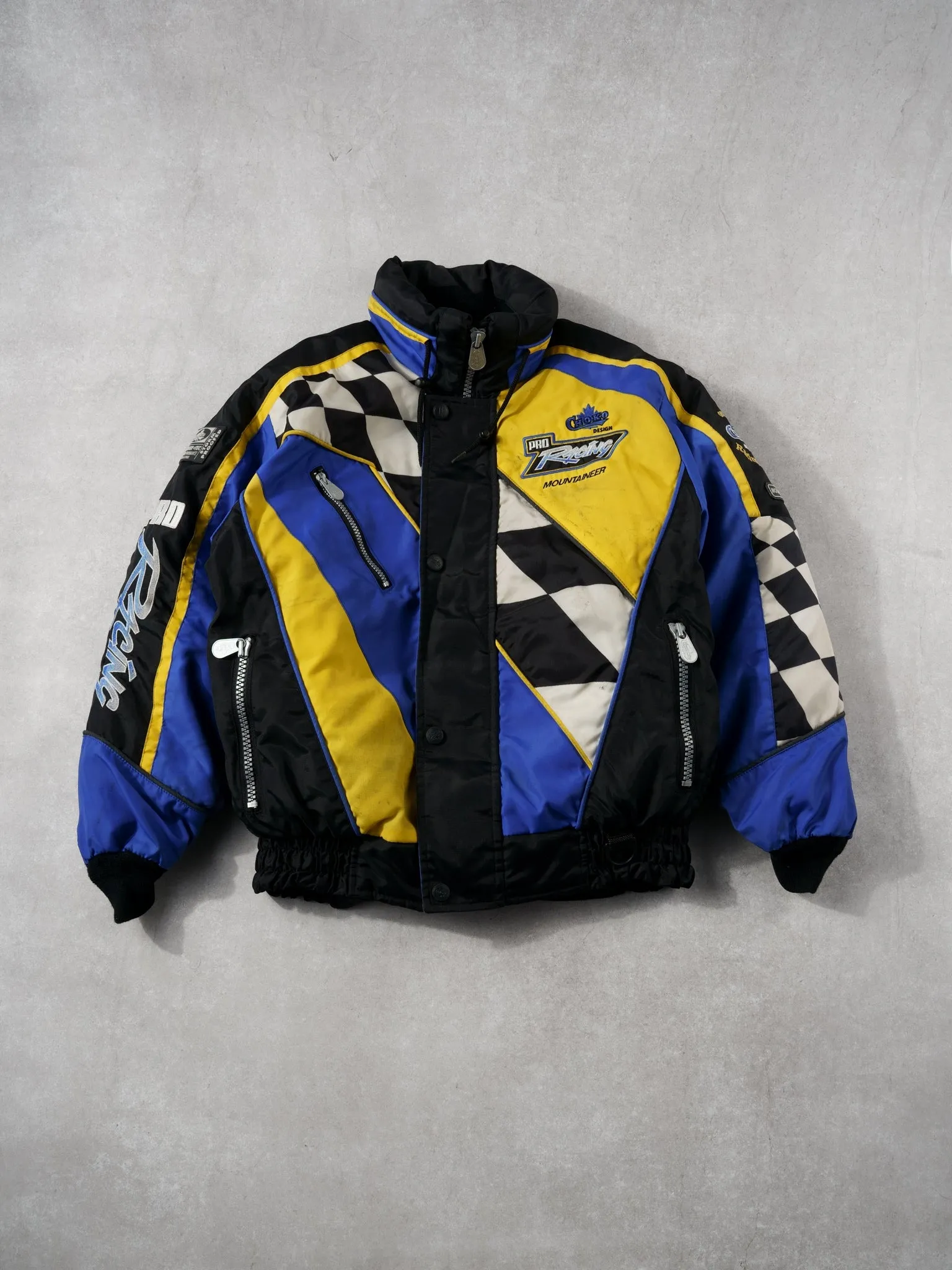 Vintage 90s Blue and Yellow Chako Racing Pro Insulated Racing Jacket (M) sold by Rebalance Vintage