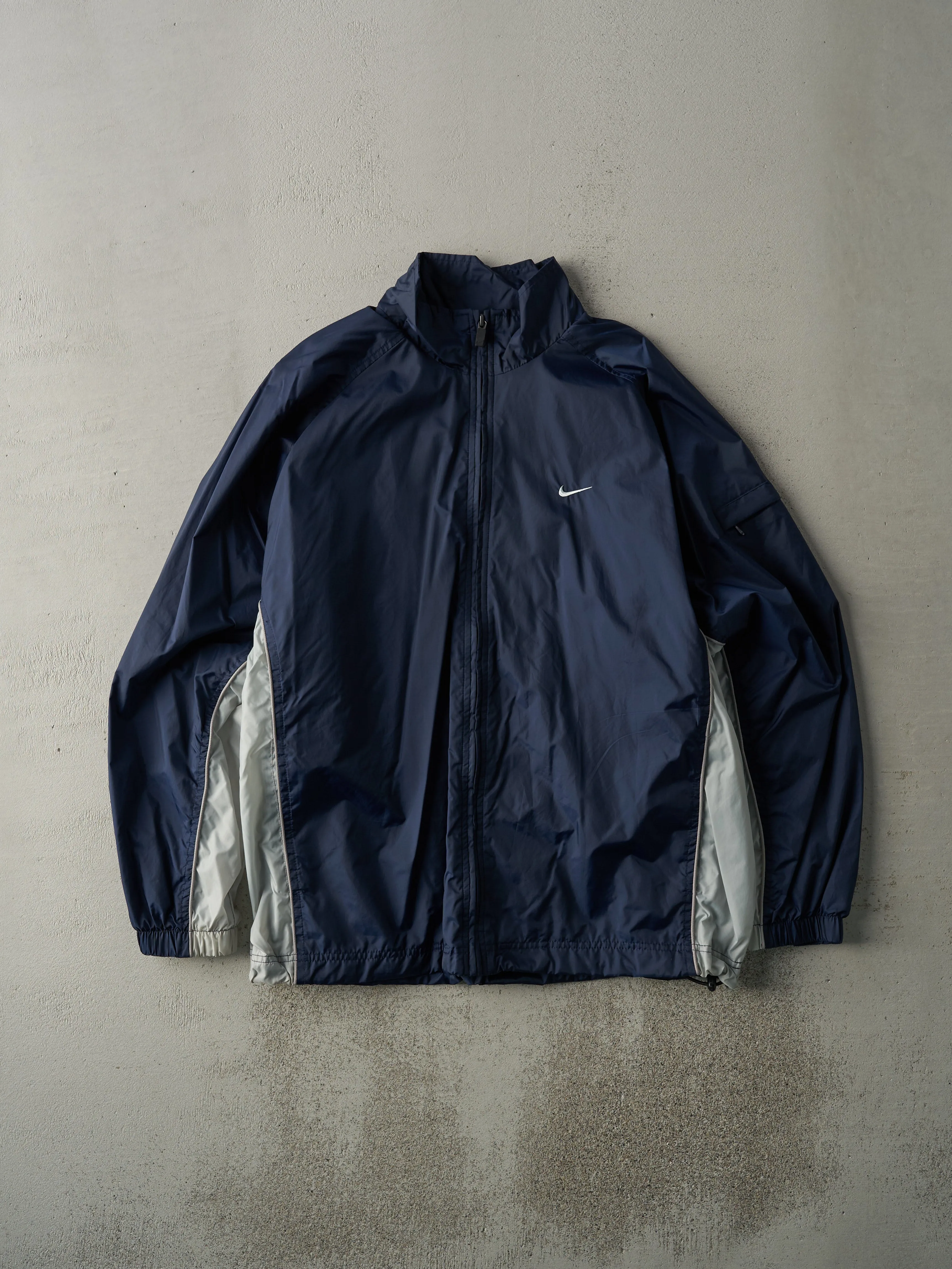 Vintage Y2K Navy Blue Nike Windbreaker Jacket (L) sold by Rebalance Vintage