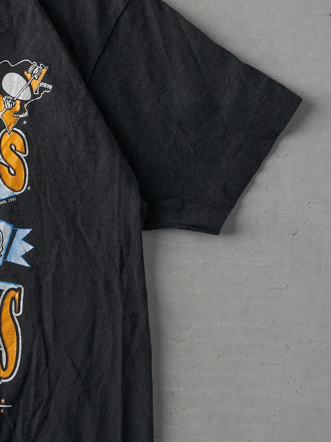 Vintage 91' Black Pittsburgh Penguins Champions Single Stitch Tee (S/M) sold by Rebalance Vintage product image thumbnail 3
