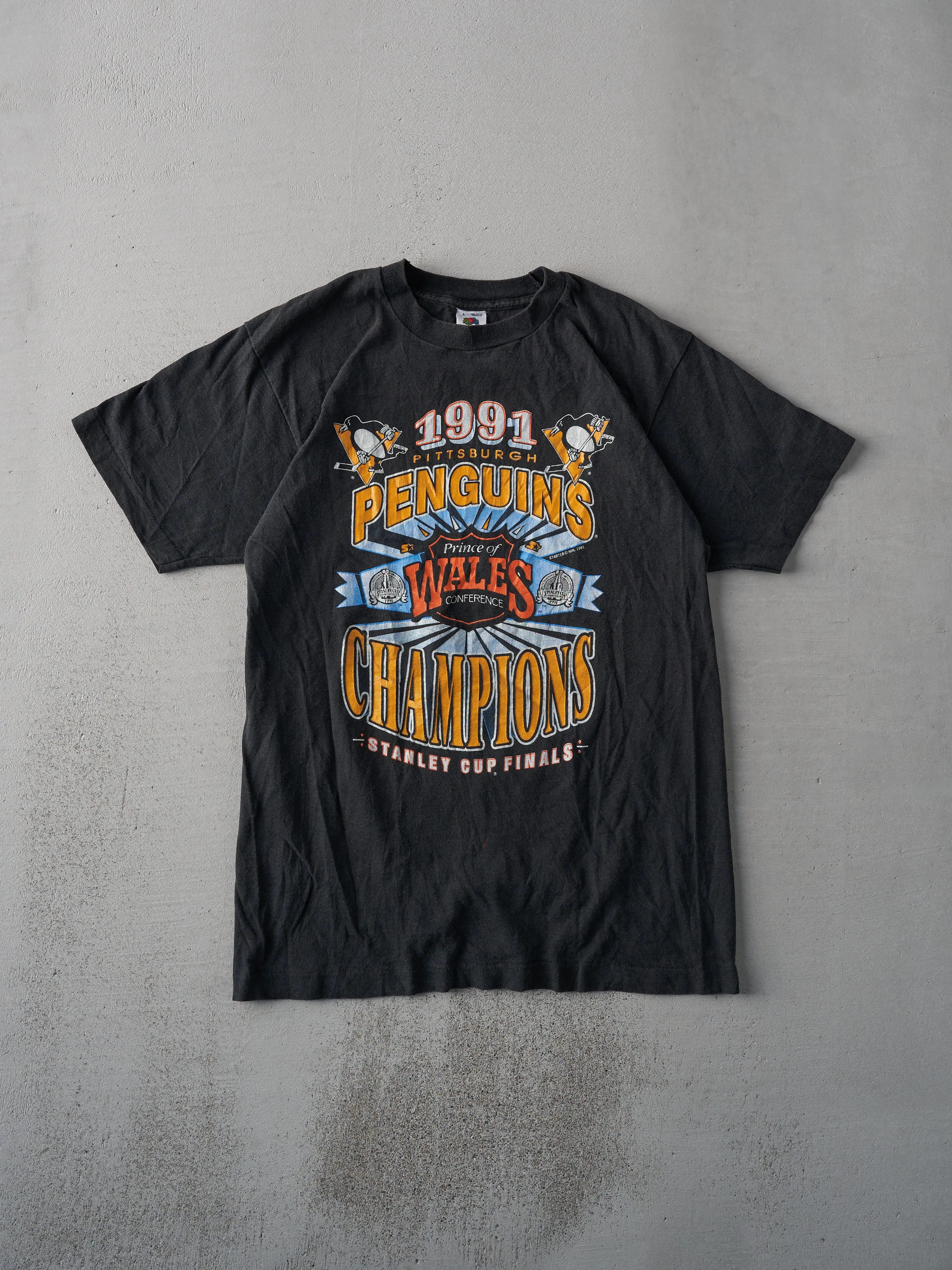Vintage 91' Black Pittsburgh Penguins Champions Single Stitch Tee (S/M) sold by Rebalance Vintage