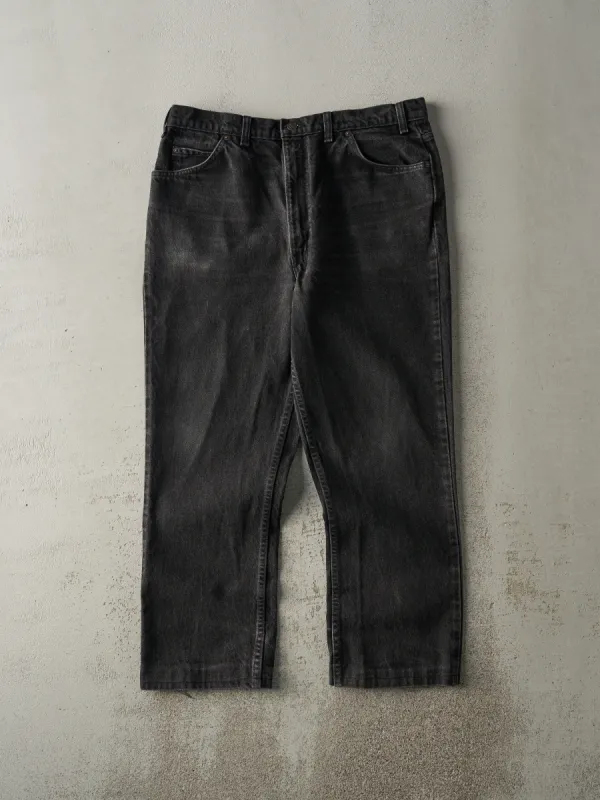 Vintage 90s Faded Black Levi's 619 Orange Tab Denim Pants (36x28) sold by Rebalance Vintage