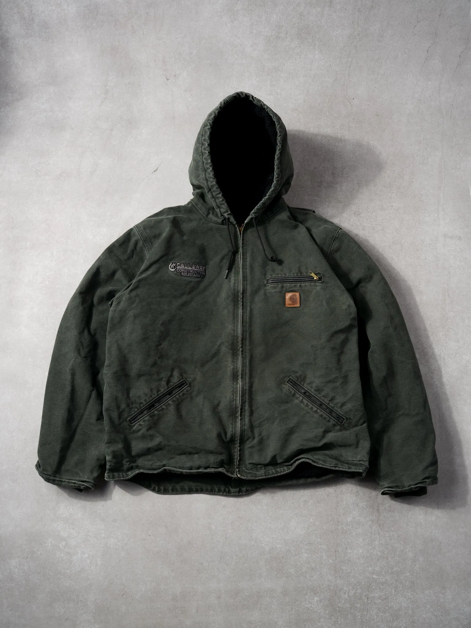 Vintage Washed Dark Green Carhartt "Callaway" Hooded Lined Workwear Jacket (L) sold by Rebalance Vintage