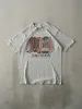 Vintage 90s Heather Grey Houston Disney Cowboy Boot Single Stitch Tee (S) sold by Rebalance Vintage