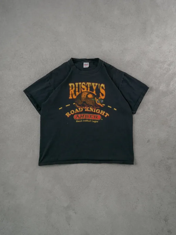 Vintage 90s Black Rusty's Handcrafted Lager Graphic Tee (M) sold by Rebalance Vintage