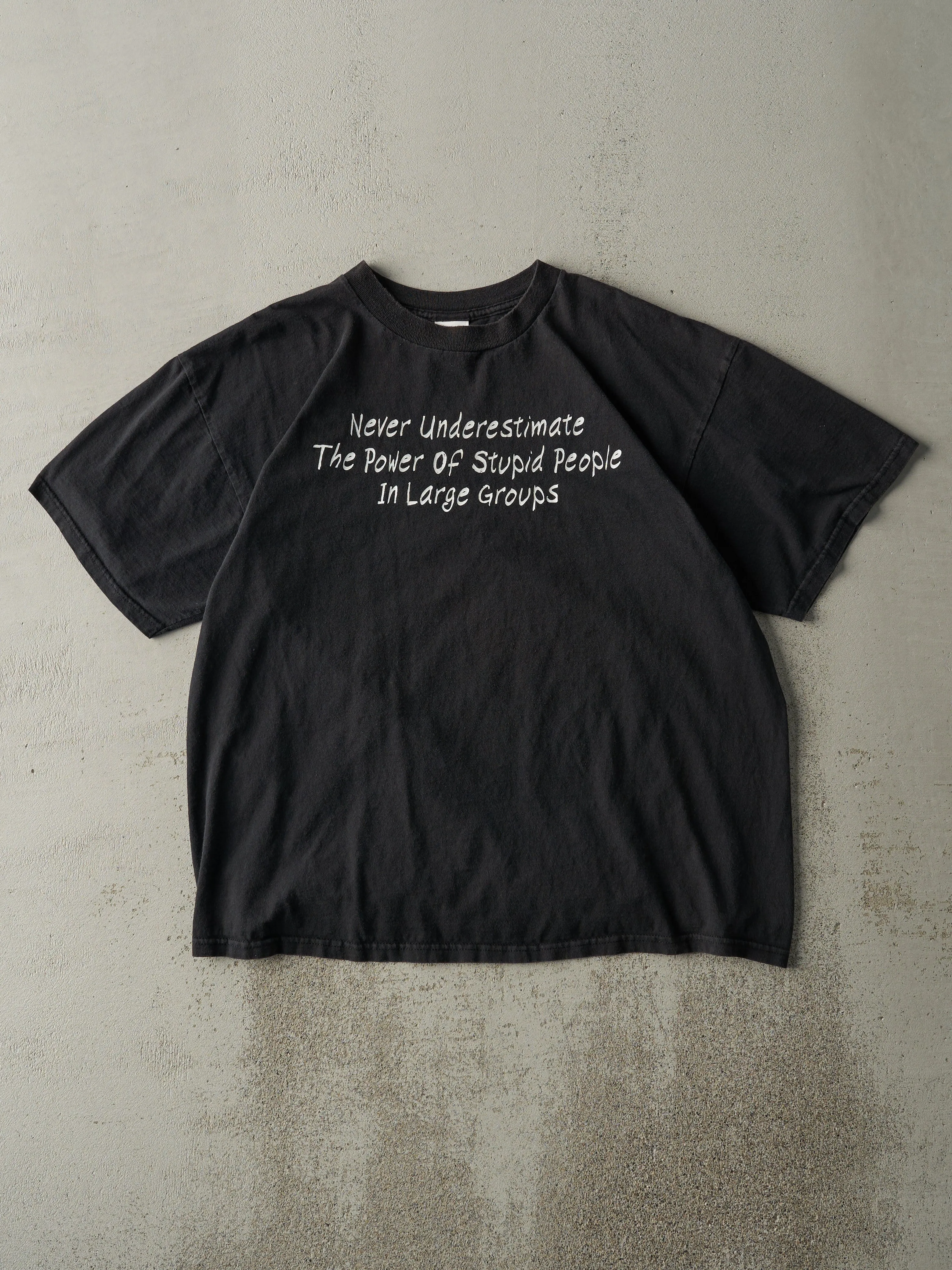 Vintage Y2K Black "The Power Of Stupid People" Slogan Tee (L) sold by Rebalance Vintage