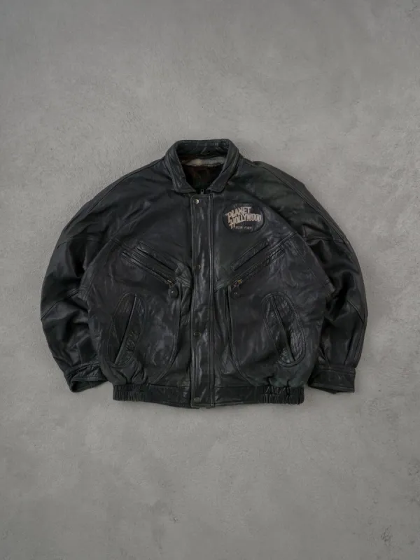 Vintage 90s Black Planet Hollywood New York Leather Jacket (XL) sold by Rebalance Vintage
