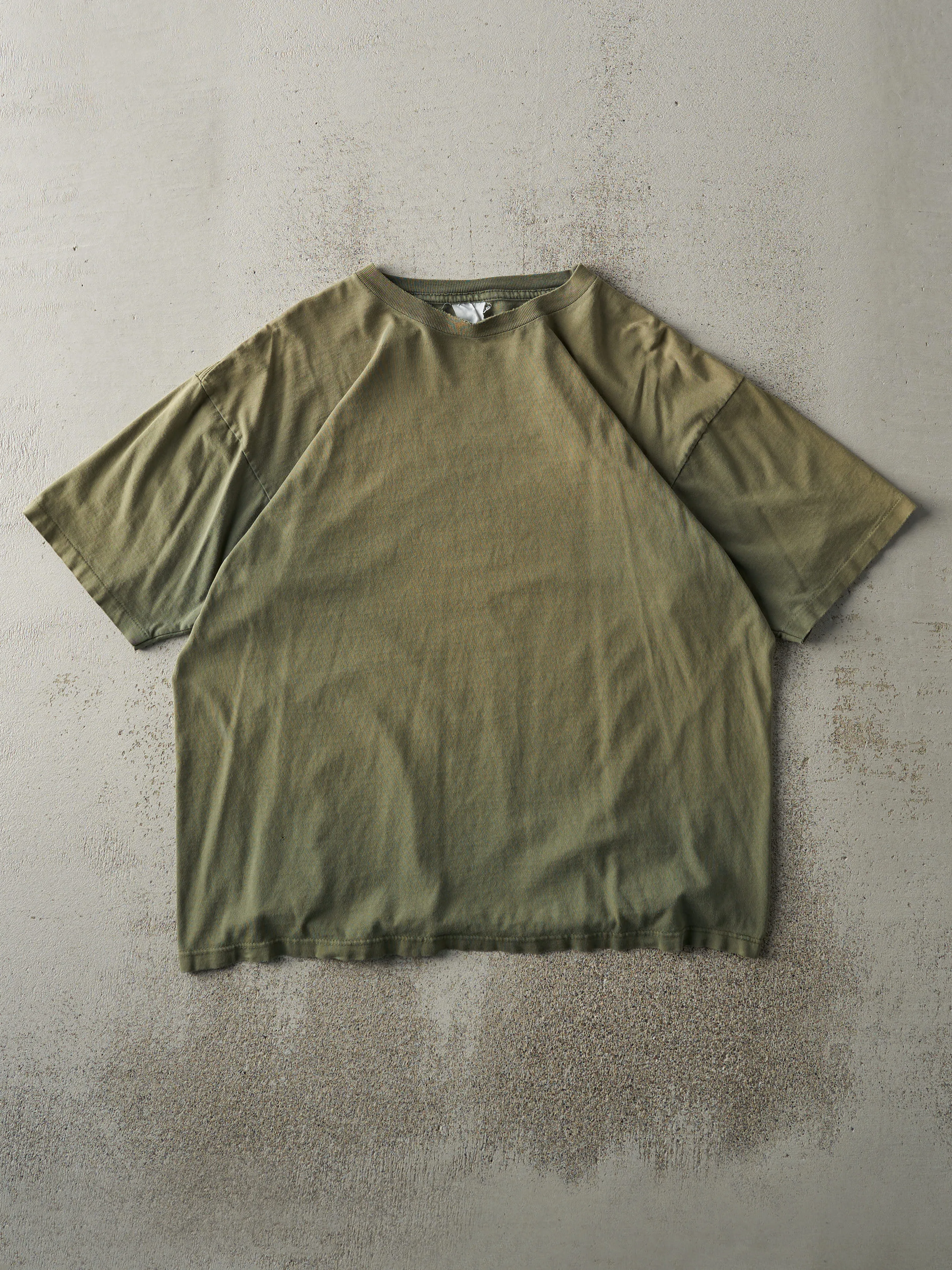 Vintage 90s Sun Faded Green Blank Single Stitch Tee (L) sold by Rebalance Vintage