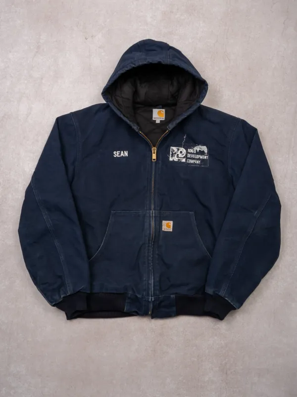 Vintage 90s Dark Blue Carhartt Ross Develoment Duck Insulated Jacket (L) sold by Rebalance Vintage