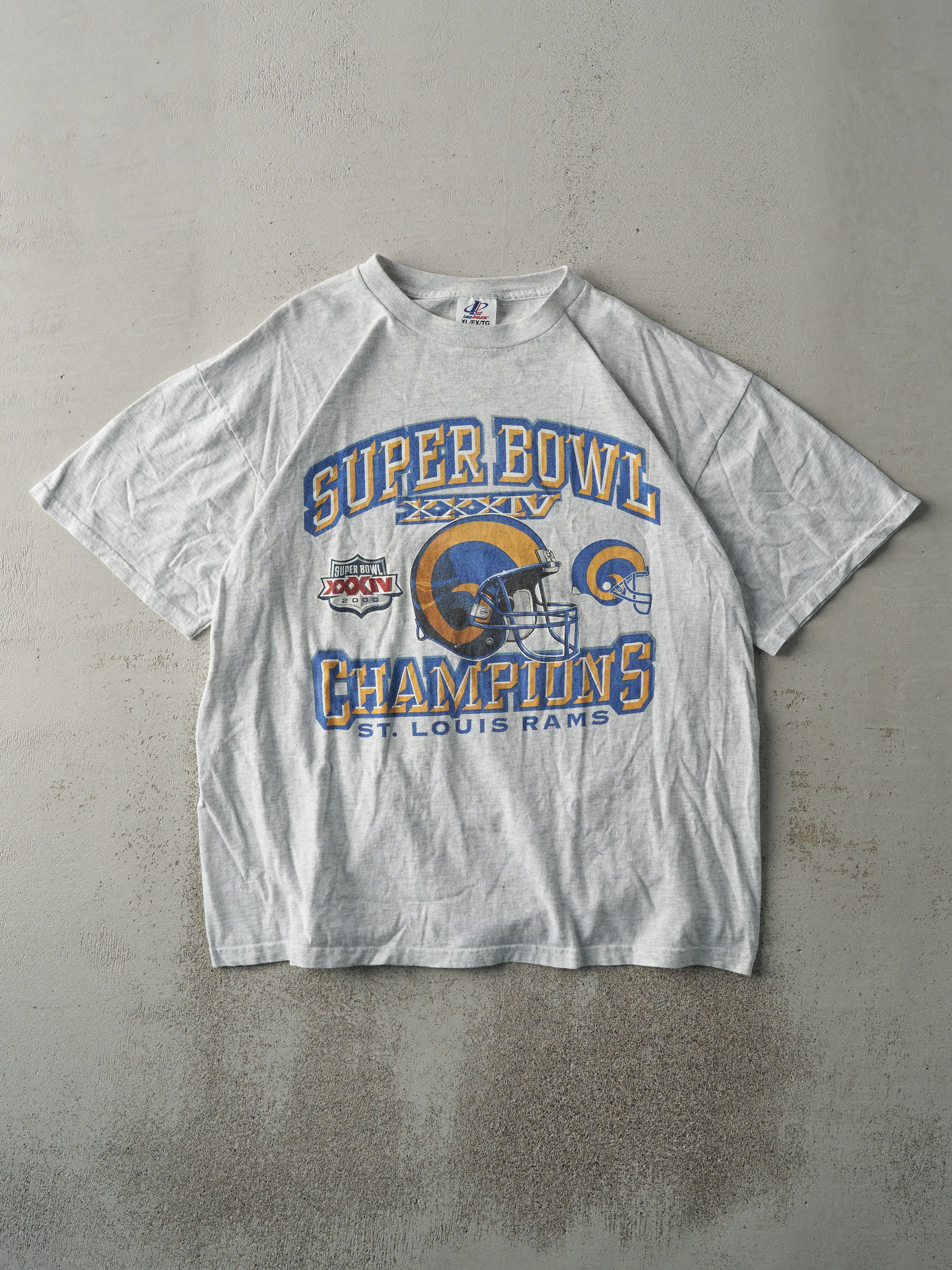 Vintage 00' Heather Grey St. Louis Rams Super Bowl XXXIV Champions Tee (L) sold by Rebalance Vintage