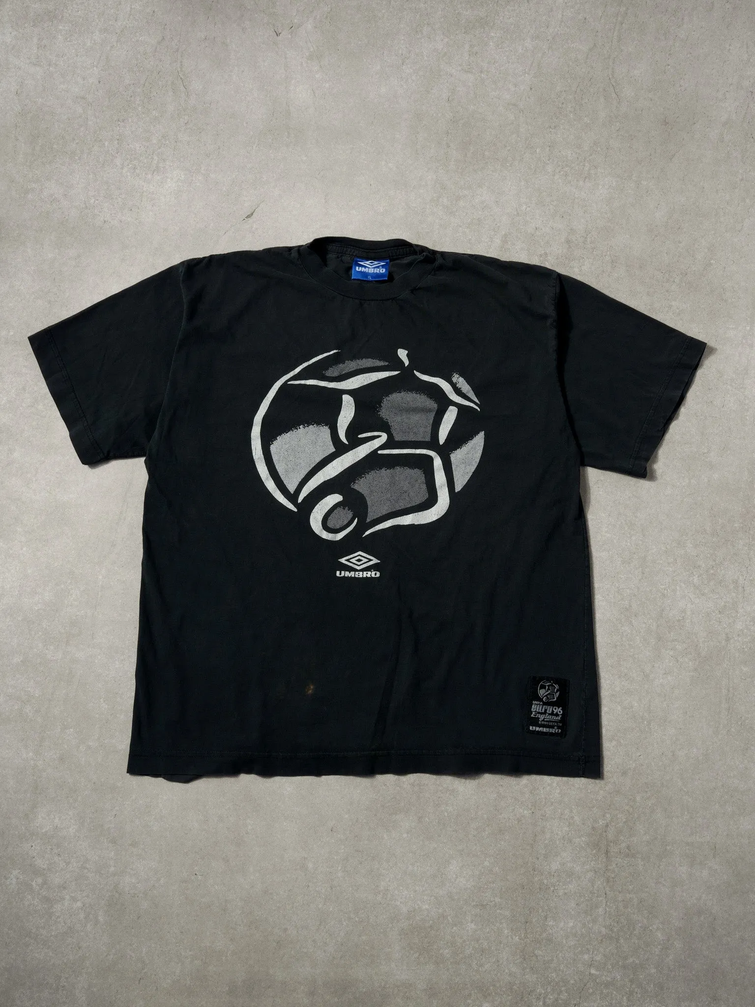 Vintage 96' Washed Black UEFA Euro 96 Soccer Umbro Graphic Tee (L) sold by Rebalance Vintage