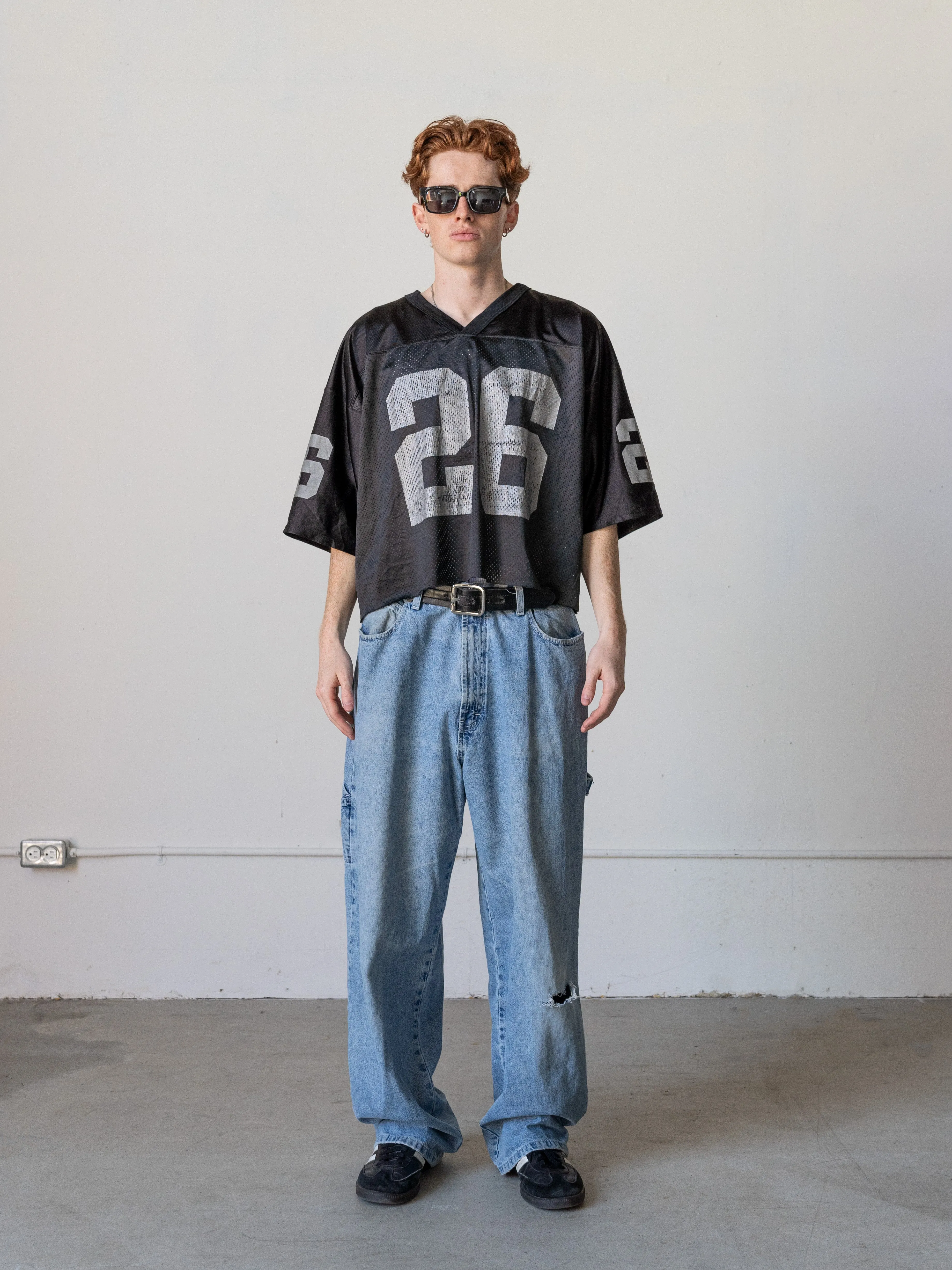 Vintage 90s Black Oakland Raider #26 Napoleon Kaufman Cropped Jersey (M) sold by Rebalance Vintage product image thumbnail 2