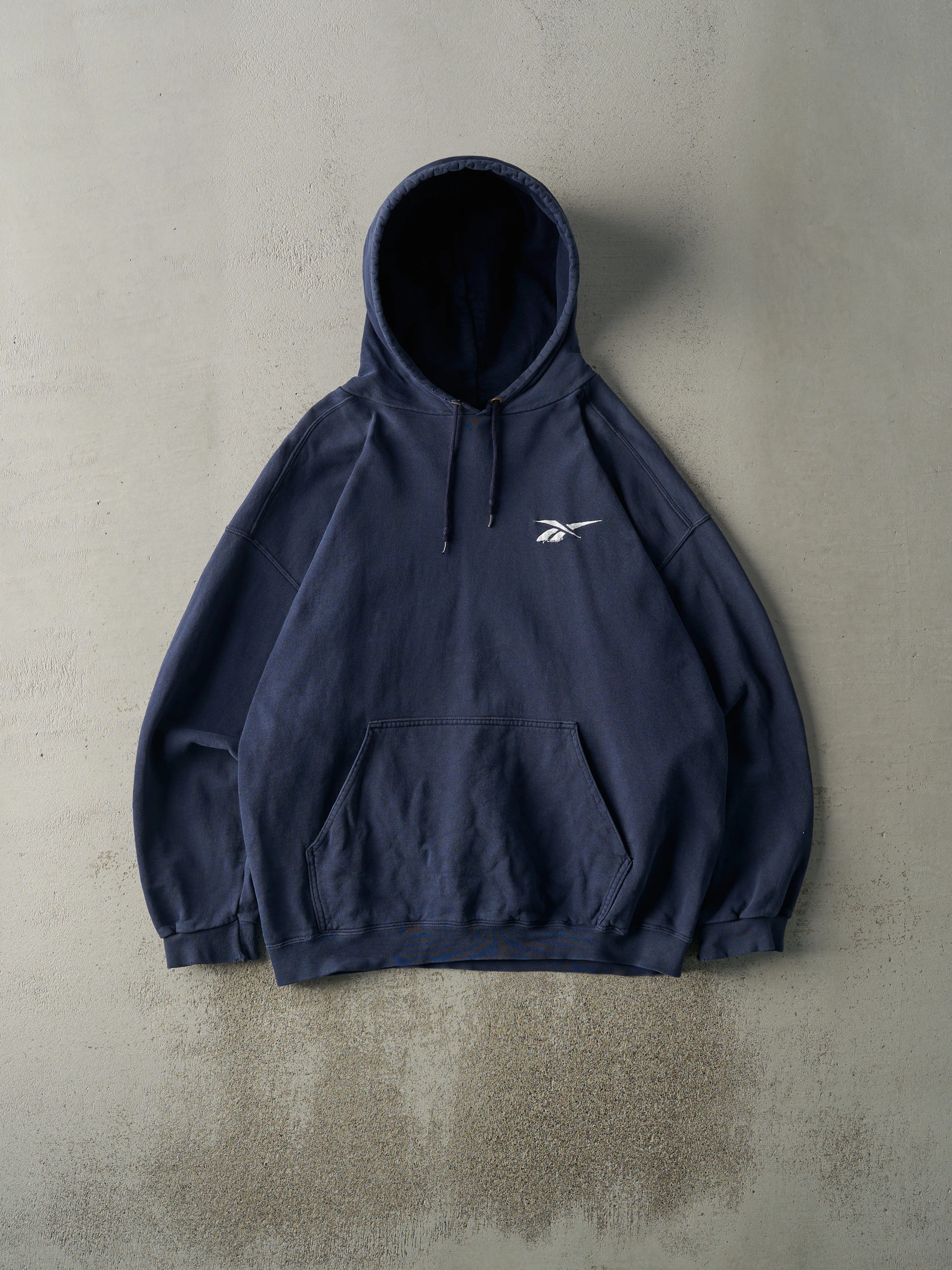 Vintage 90s Navy Blue Embroidered Reebok Hoodie (L) sold by Rebalance Vintage