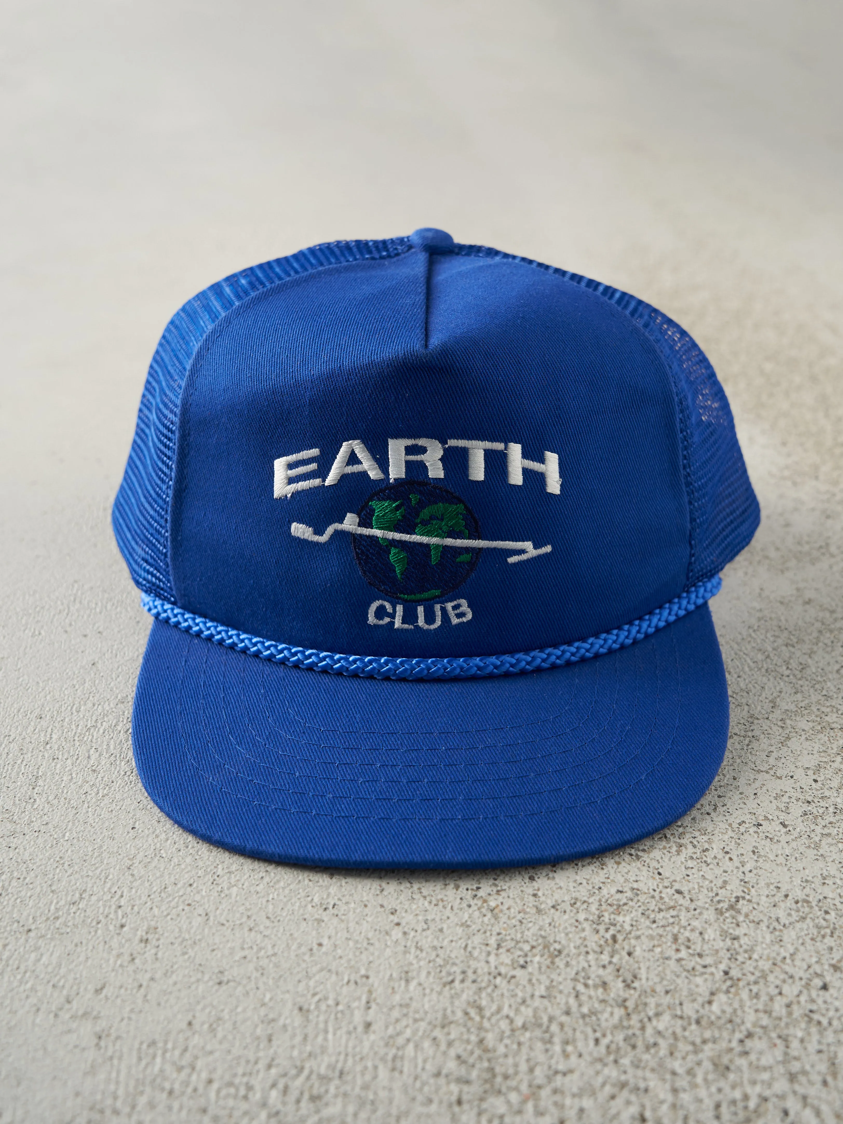 Vintage 80s Blue Embroidered Earth Club Trucker Hat sold by Rebalance Vintage