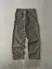 Vintage 90s Brown Rustler Carpenter Pants (32x34) sold by Rebalance Vintage