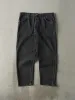 Vintage 90s Faded Black Wrangler Denim Pants (37x29) sold by Rebalance Vintage