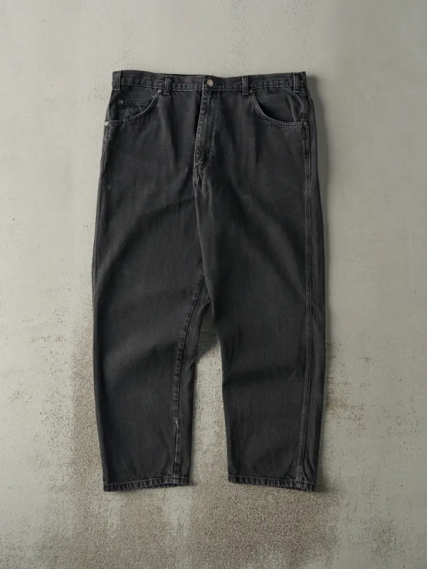 Vintage 90s Faded Black Wrangler Denim Pants (37x29) sold by Rebalance Vintage