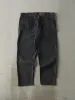 Vintage 90s Faded Black Wrangler Denim Pants (37x29) sold by Rebalance Vintage