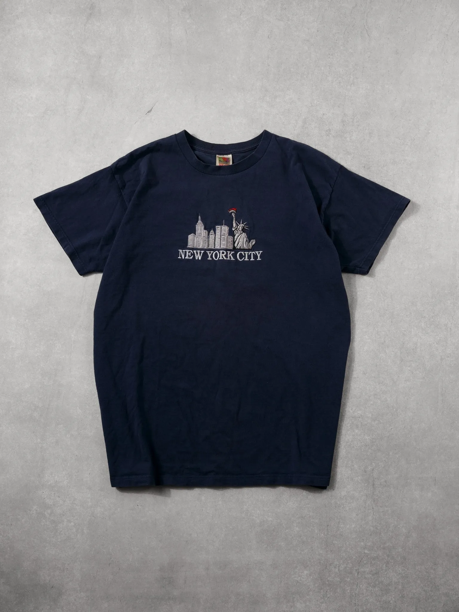 Vintage 90s Navy Blue New York City Embroidery Tee (L) sold by Rebalance Vintage