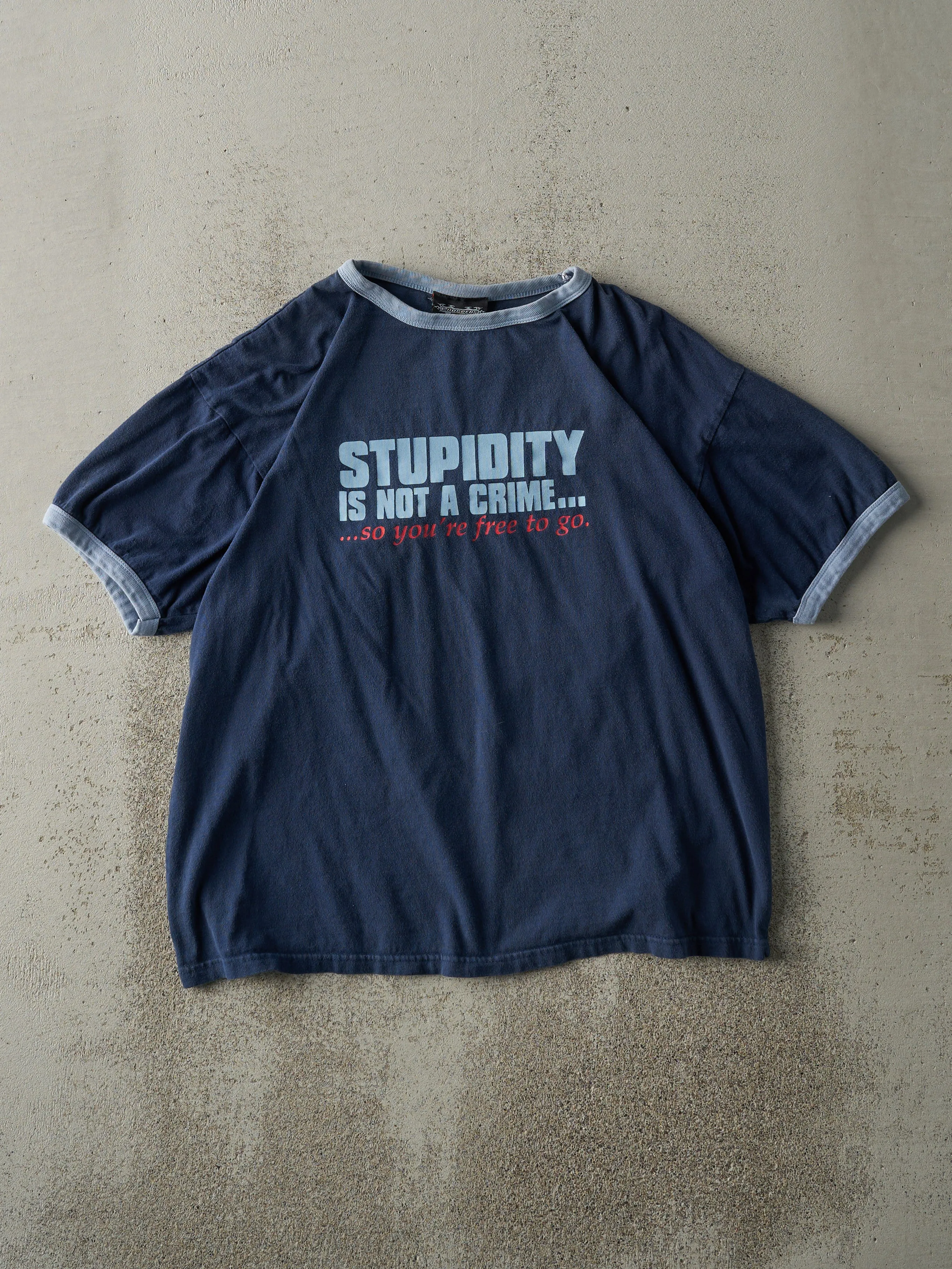Vintage Y2K Navy Blue "Stupidity is Not A Crime.." Slogan Ringer Tee (S/M) sold by Rebalance Vintage