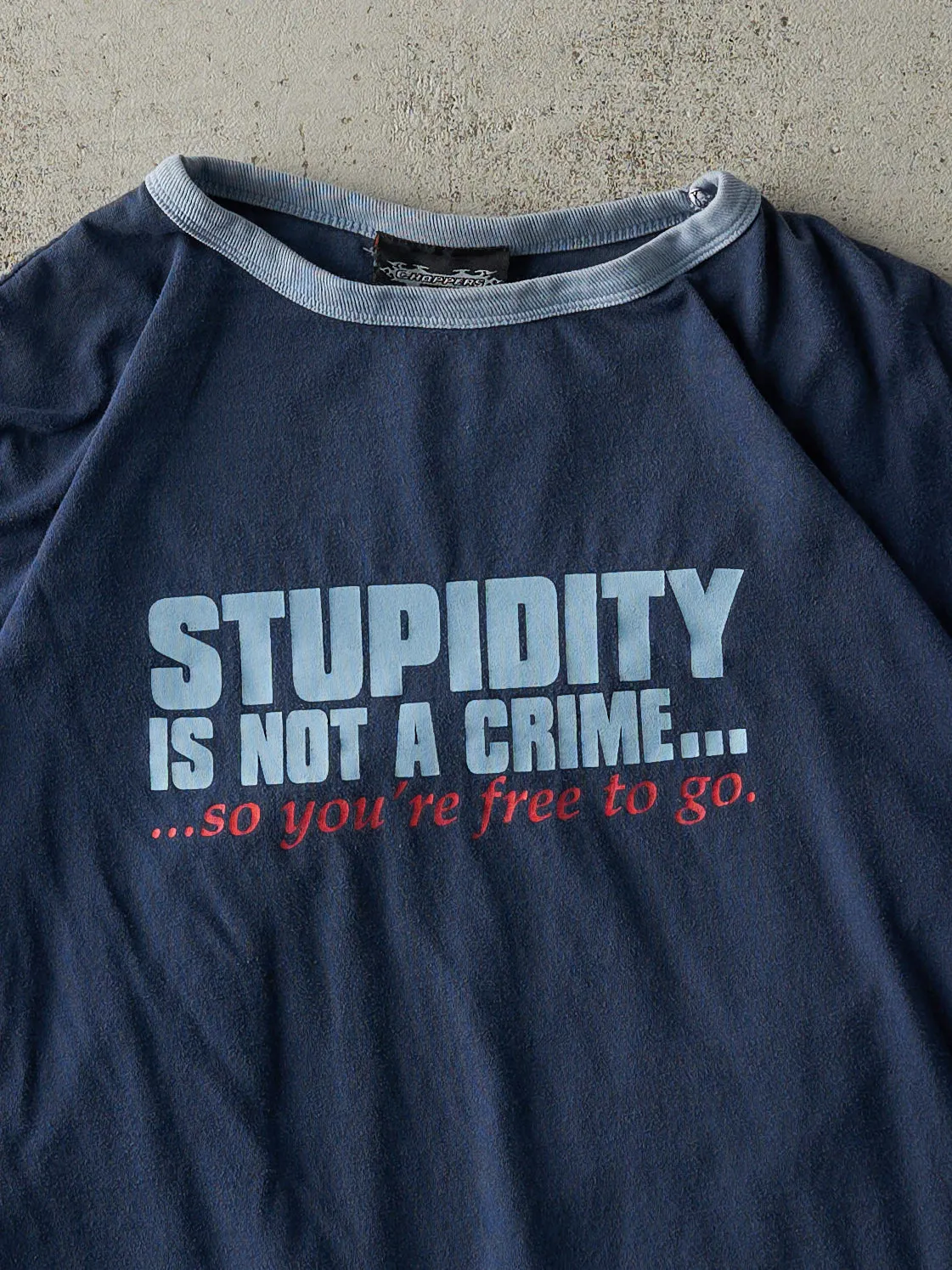 Vintage Y2K Navy Blue "Stupidity is Not A Crime.." Slogan Ringer Tee (S/M) sold by Rebalance Vintage product image thumbnail 2