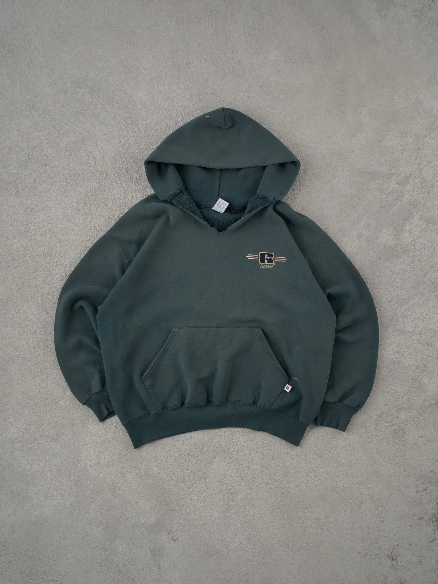 Vintage 90s Faded Dark Green Russell Athletics Emblem Hoodie (L) sold by Rebalance Vintage