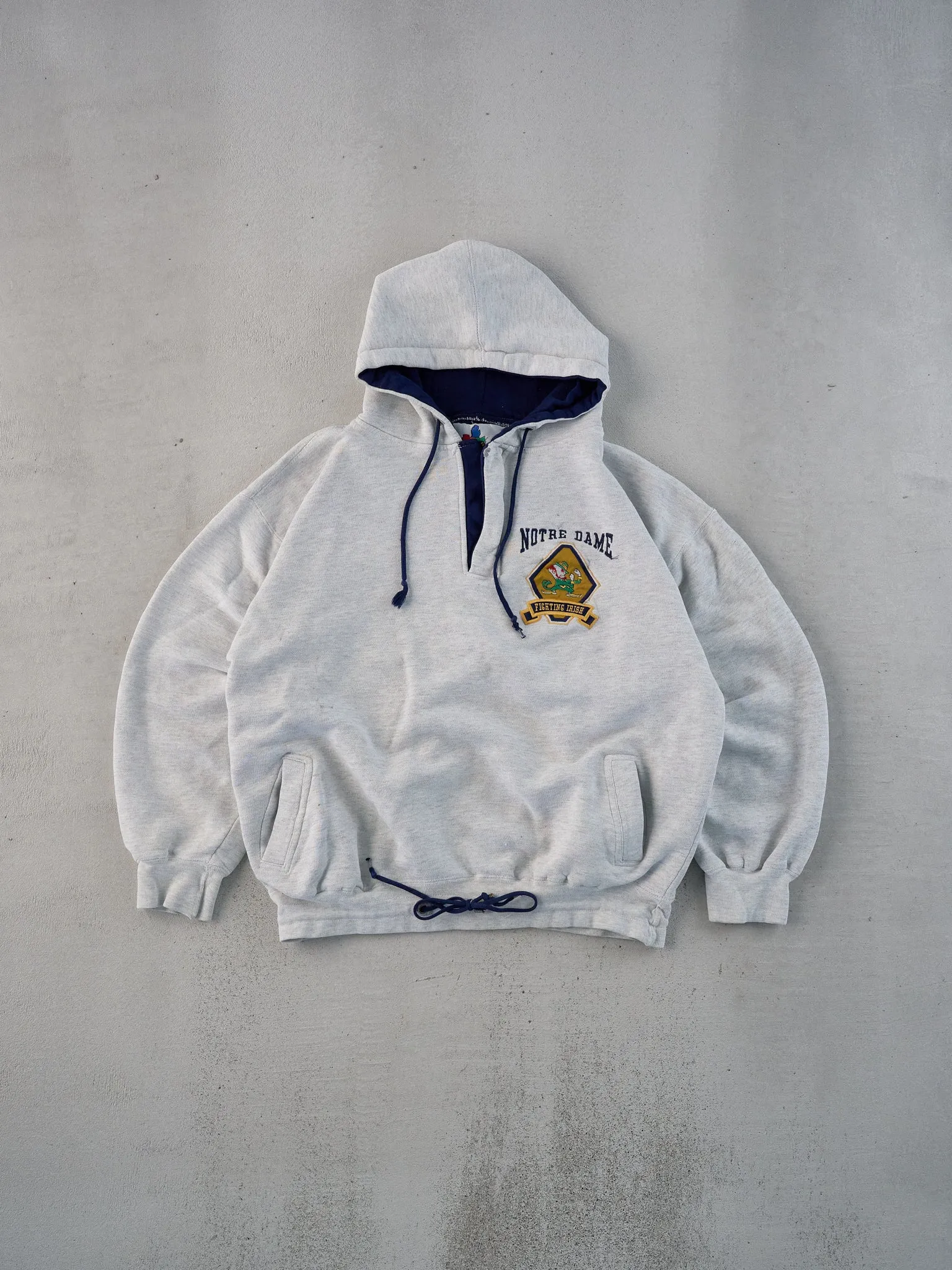 Vintage 90s Grey Notre Dame Emblem 1/4 Zip Hoodie (L) sold by Rebalance Vintage