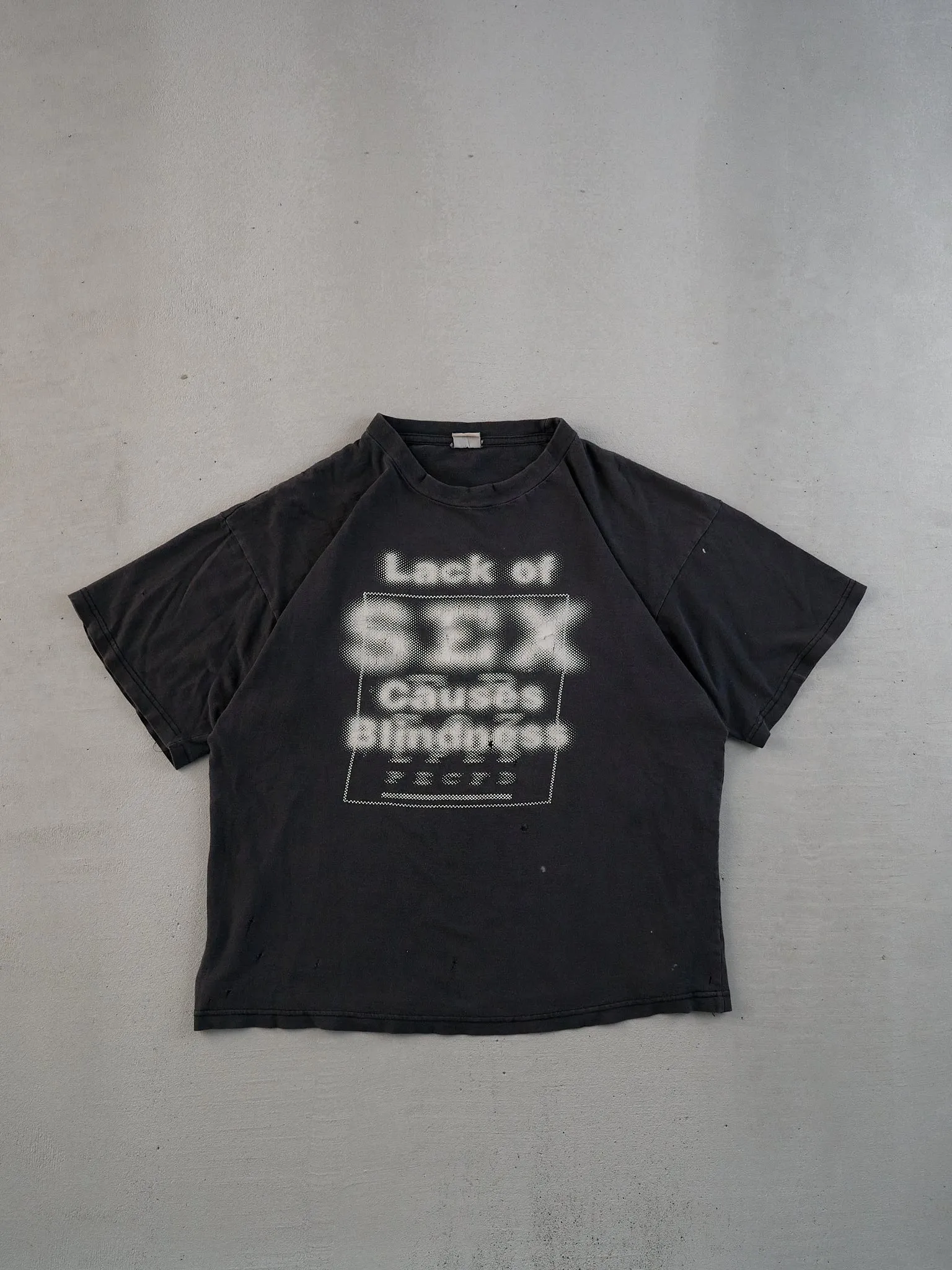 Vintage 90s Washed Black "Lack of Sex Causes Blindness" Tee (M) sold by Rebalance Vintage