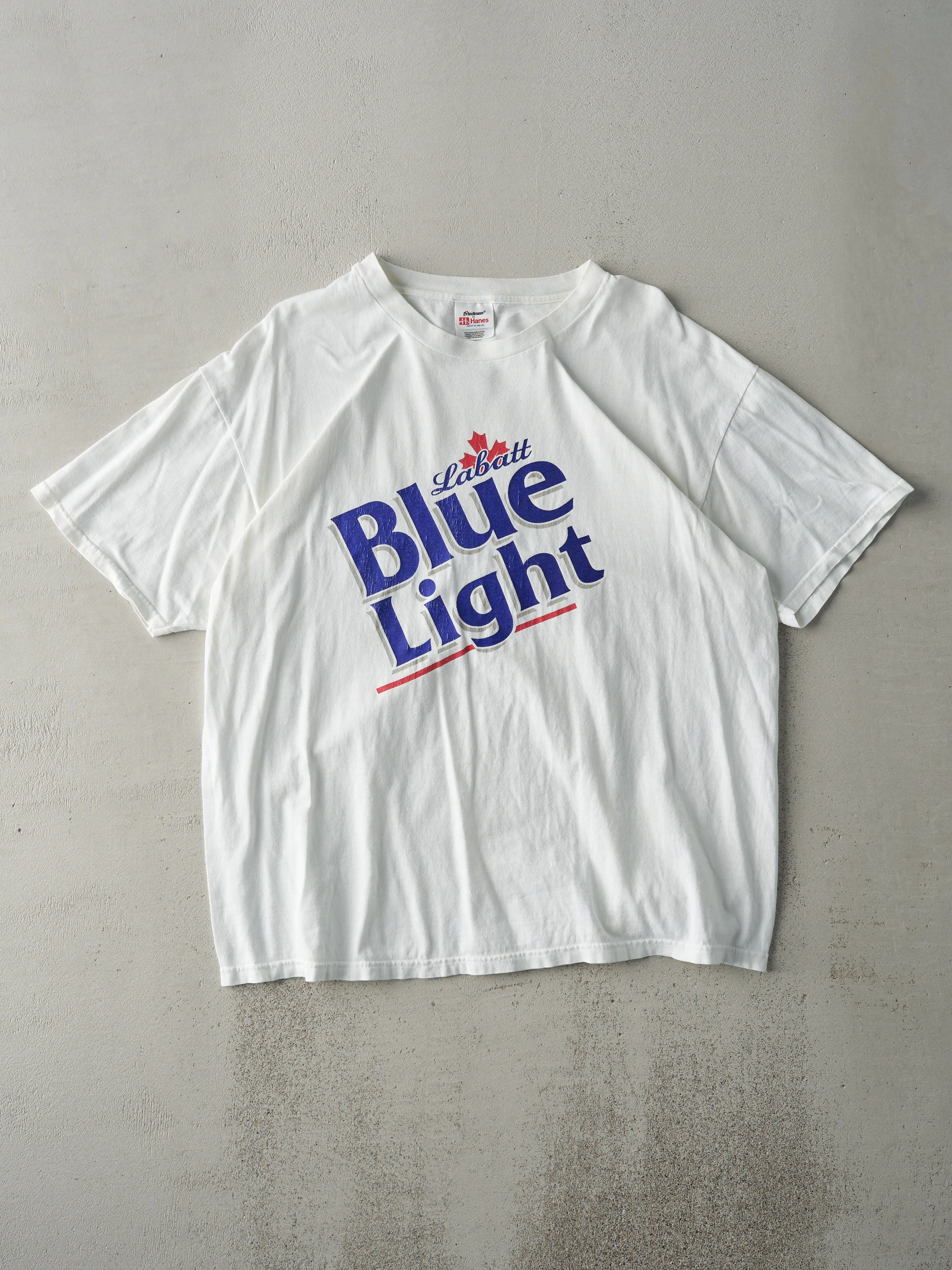 Vintage 90s White Labatt Blue Light Tee (L) sold by Rebalance Vintage