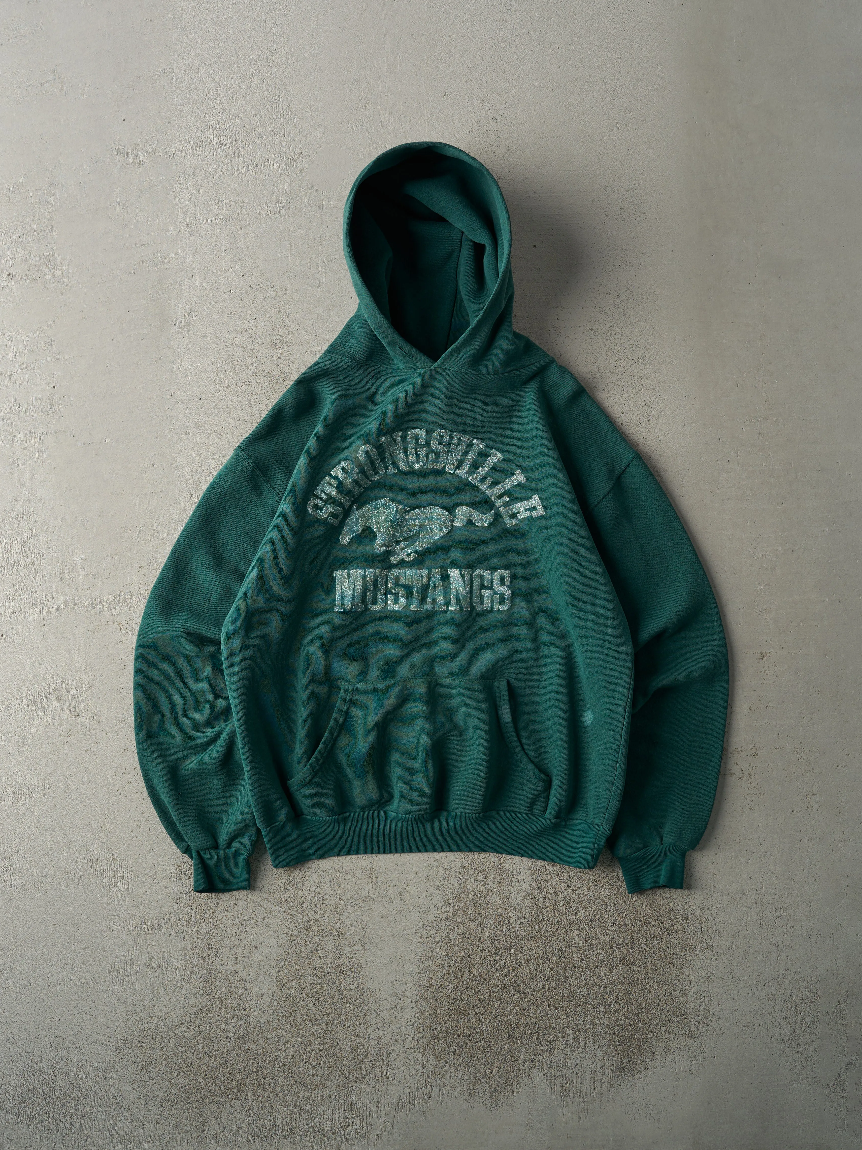 Vintage 90s Green Faded Strongsville Mustangs Hoodie (M) sold by Rebalance Vintage