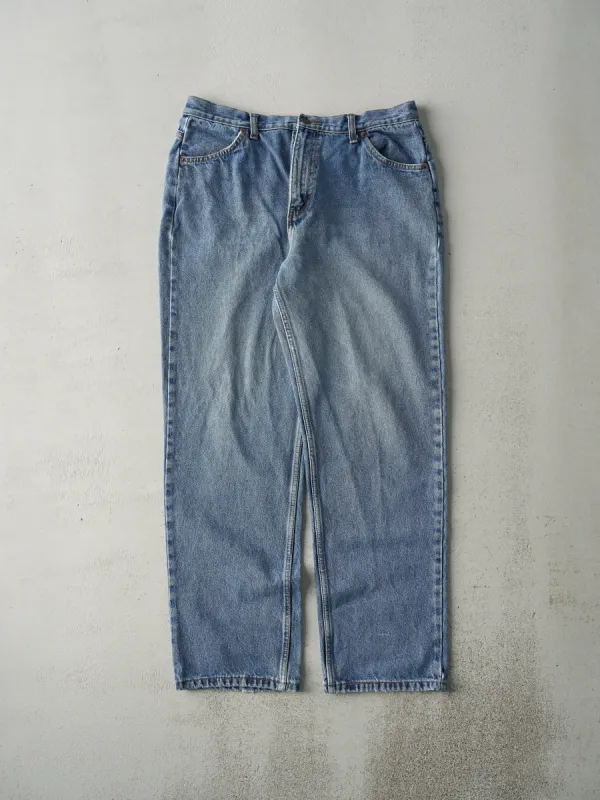 Vintage 80s Blue Levi's Orange Tab Jeans (34x30) sold by Rebalance Vintage