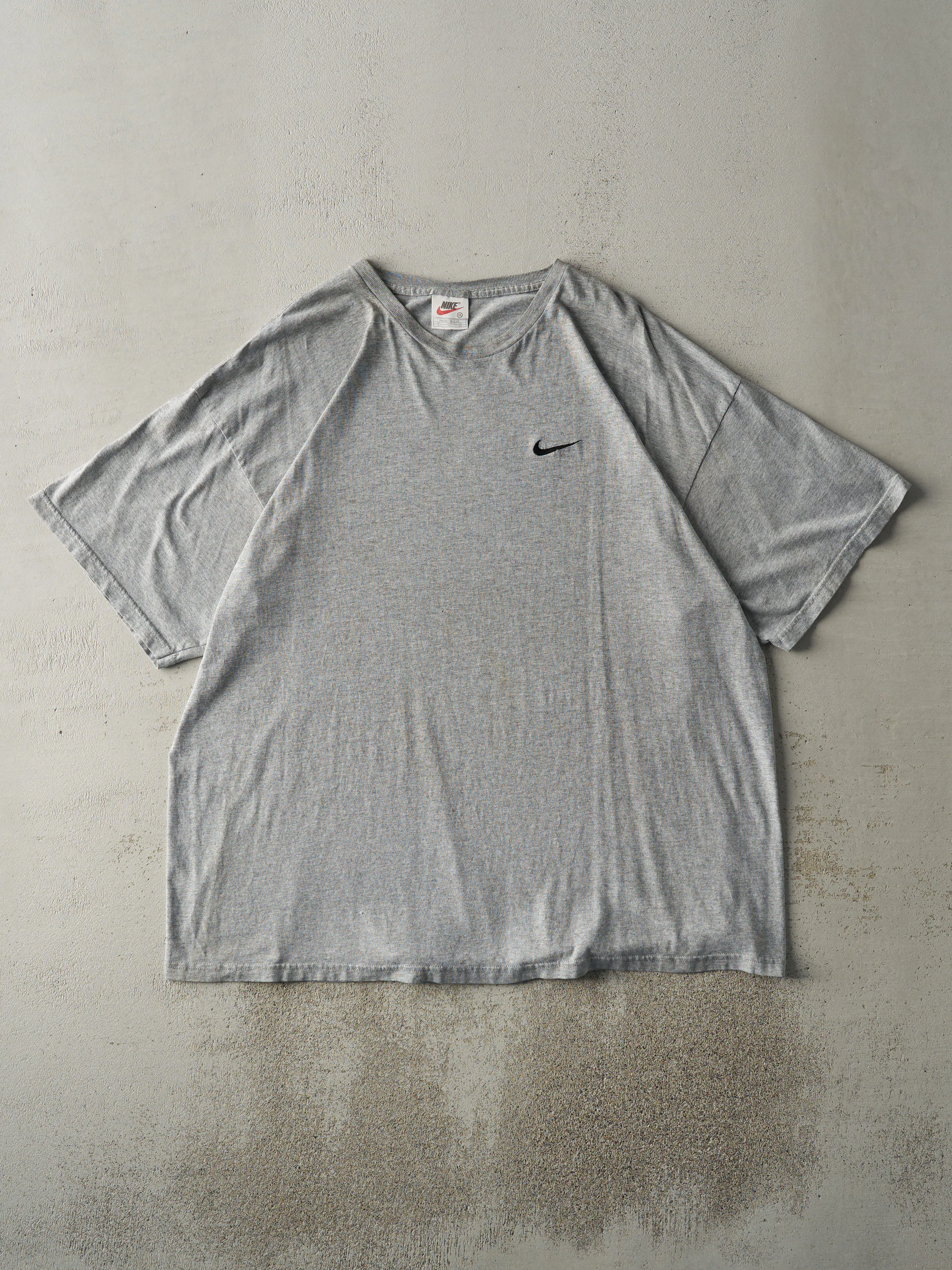Vintage 90s Grey Nike Swoosh Embroidered Tee (XXL) sold by Rebalance Vintage