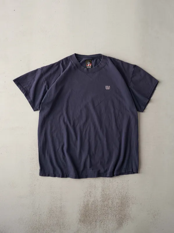 Vintage 90s Washed Blue USA Olympics x JCPenny Tee (L) sold by Rebalance Vintage