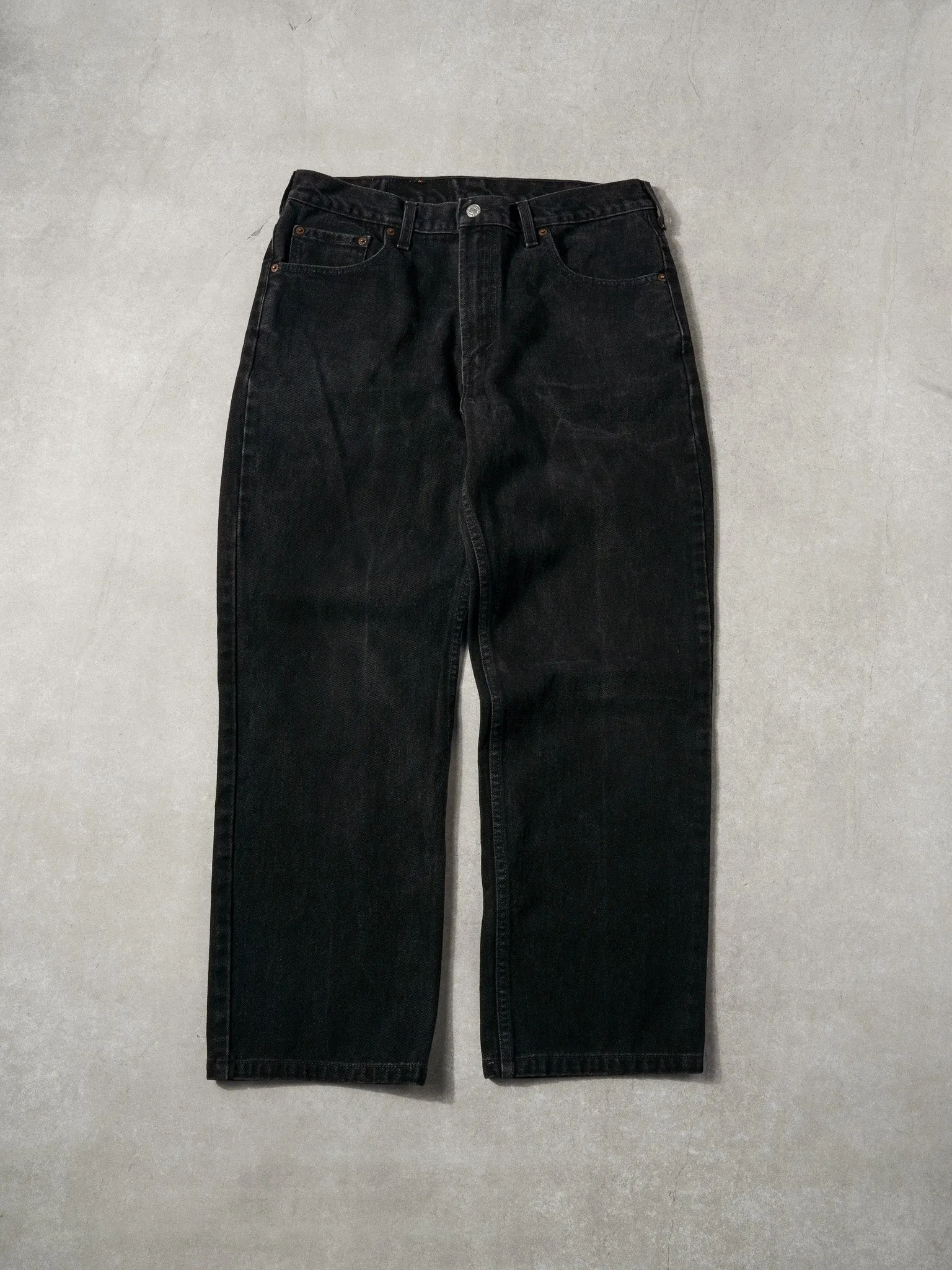 Vintage 90s Black Levi's Denim Jeans (34x28) sold by Rebalance Vintage