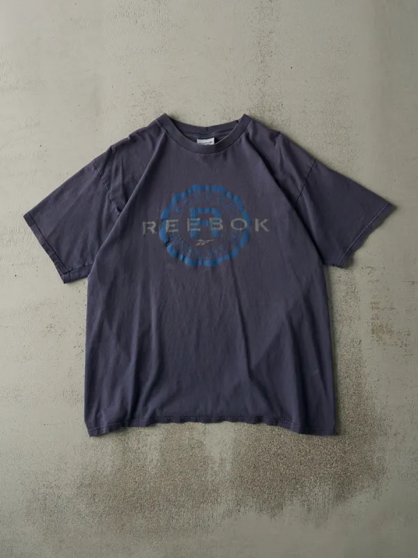 Vintage 90s Navy Blue Reebok Logo Tee (M) sold by Rebalance Vintage