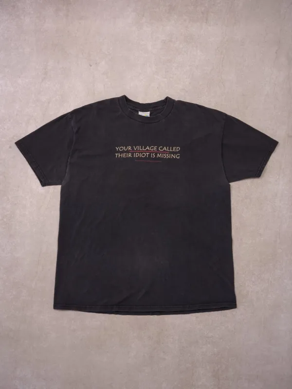Vintage "Your Village Called Their Idiot Is Missing Tee" (M) sold by Rebalance Vintage