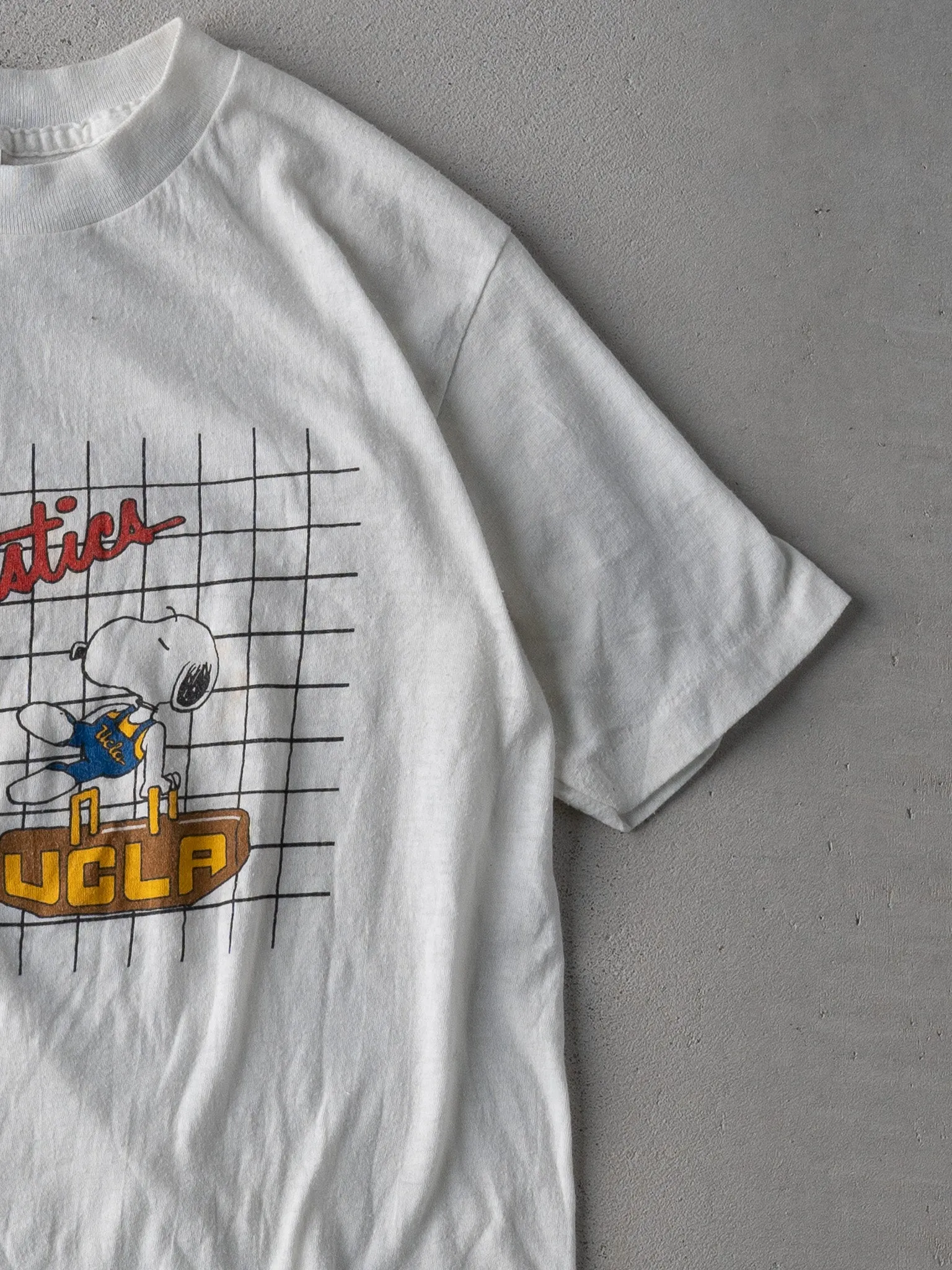 Vintage 84' White UCLA Gymnastics Snoopy Single Stitched Tee (XS) sold by Rebalance Vintage product image thumbnail 3