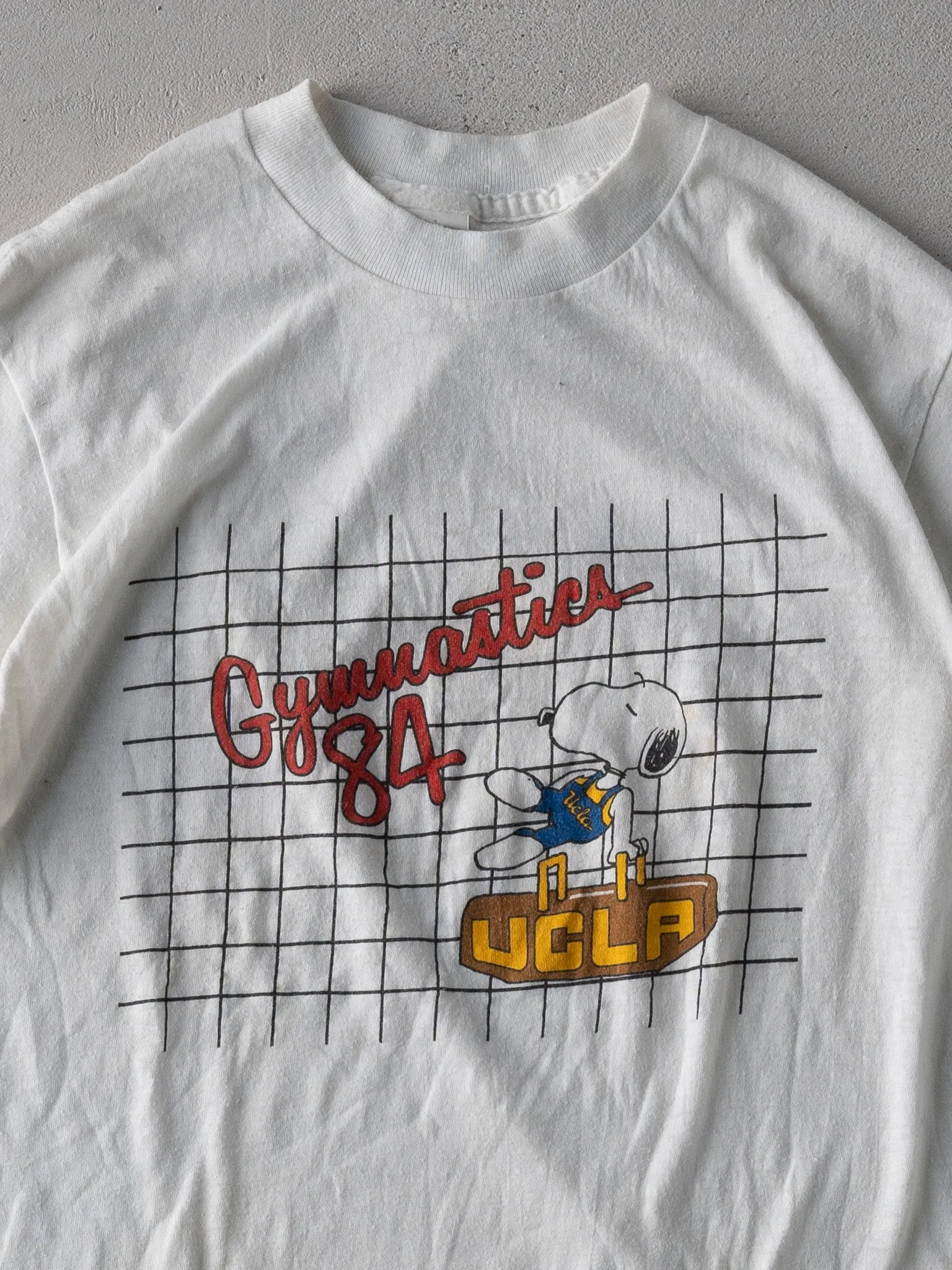 Vintage 84' White UCLA Gymnastics Snoopy Single Stitched Tee (XS) sold by Rebalance Vintage product image thumbnail 2