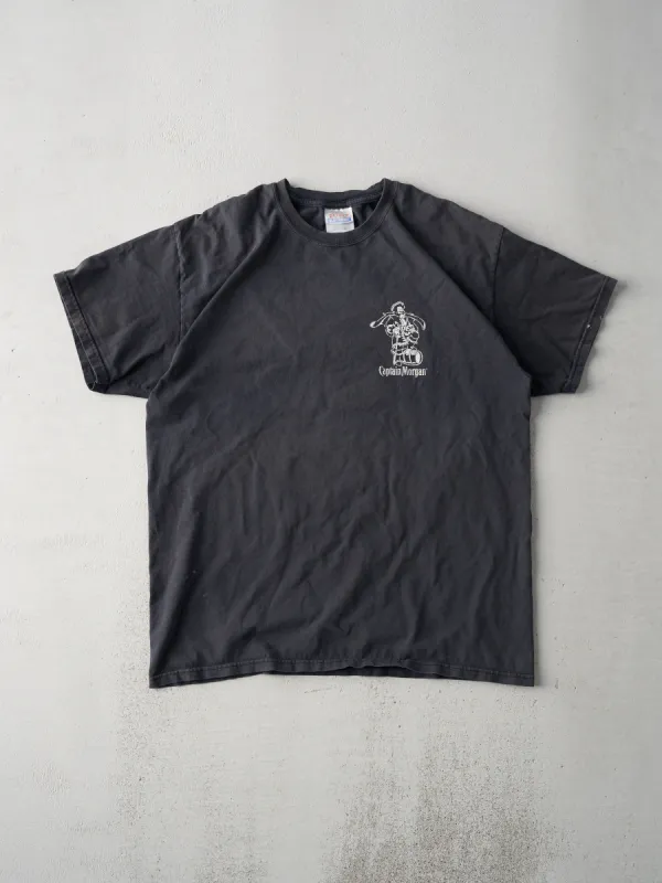 Vintage 90s Black Captain Morgan Tee (M) sold by Rebalance Vintage