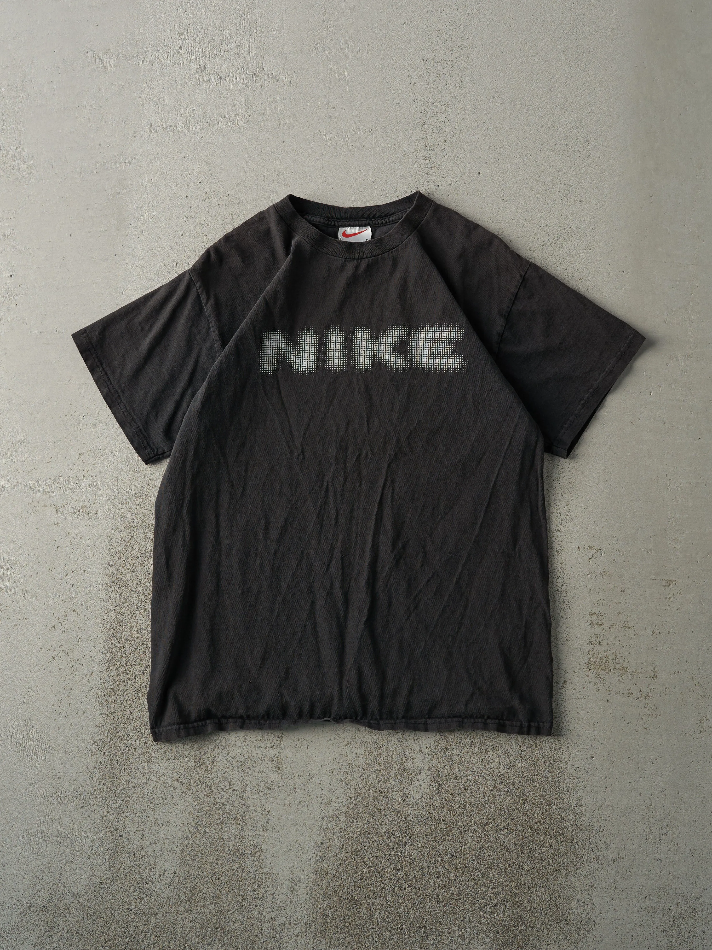 Vintage 90s Faded Black Nike Tee (M) sold by Rebalance Vintage