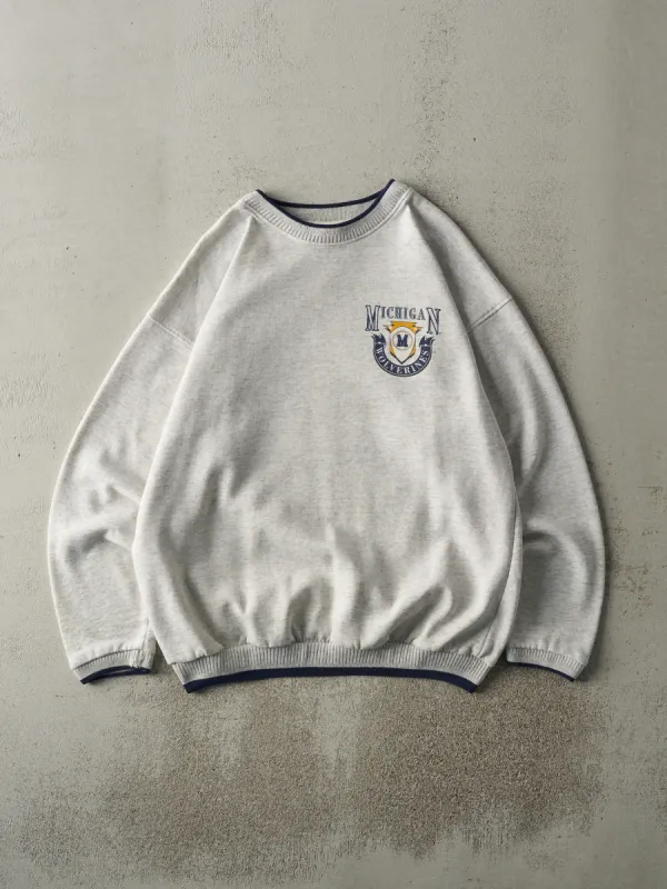 Vintage 90s Heather Grey & Navy University of Michigan Wolverines Crewneck (L) sold by Rebalance Vintage