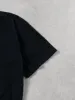 Vintage 90s Washed Black Clavin Klein Graphic Tee (M) sold by Rebalance Vintage