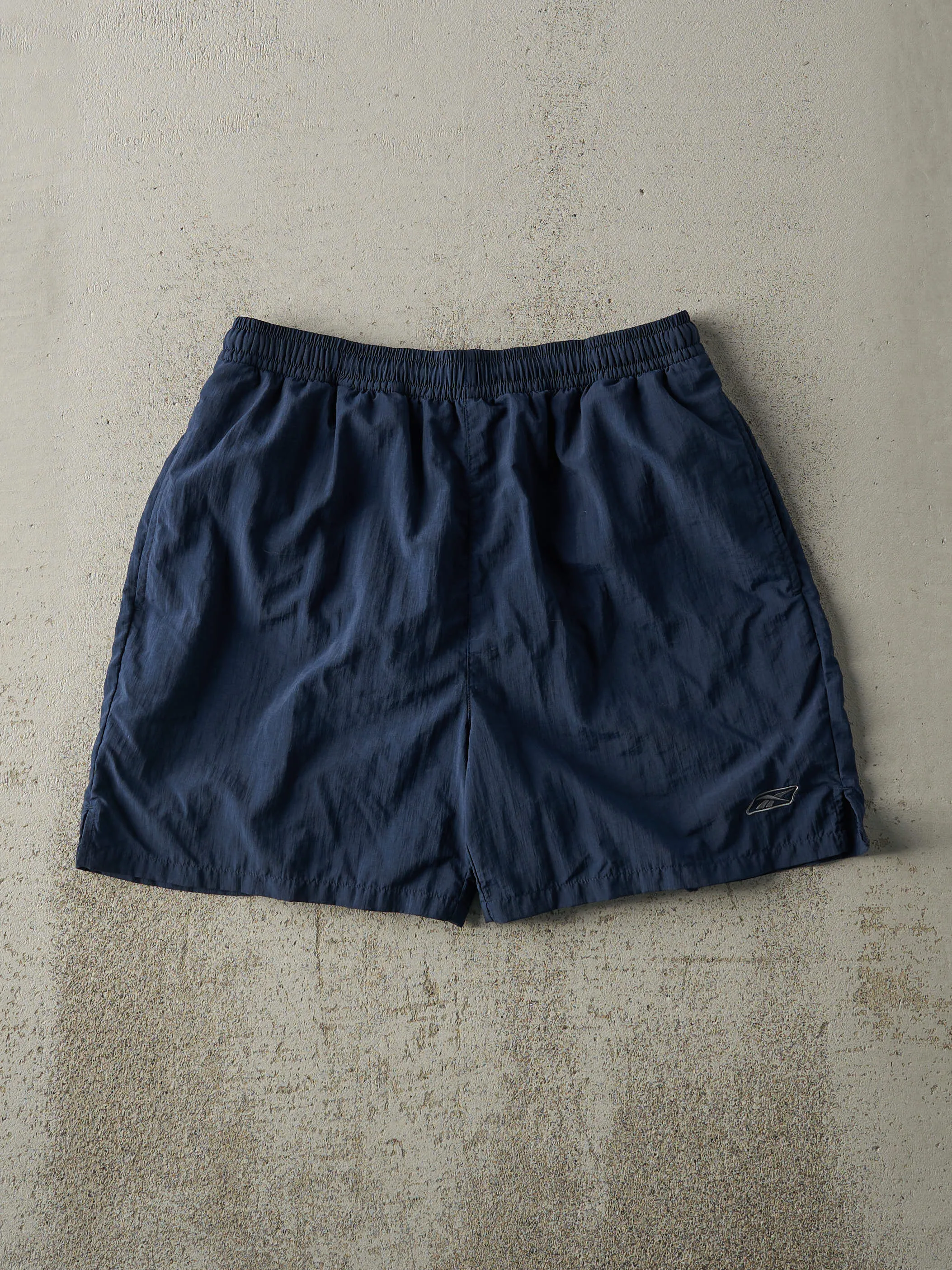 Vintage Y2K Navy Blue Reebok Track Shorts (29x5.5) sold by Rebalance Vintage