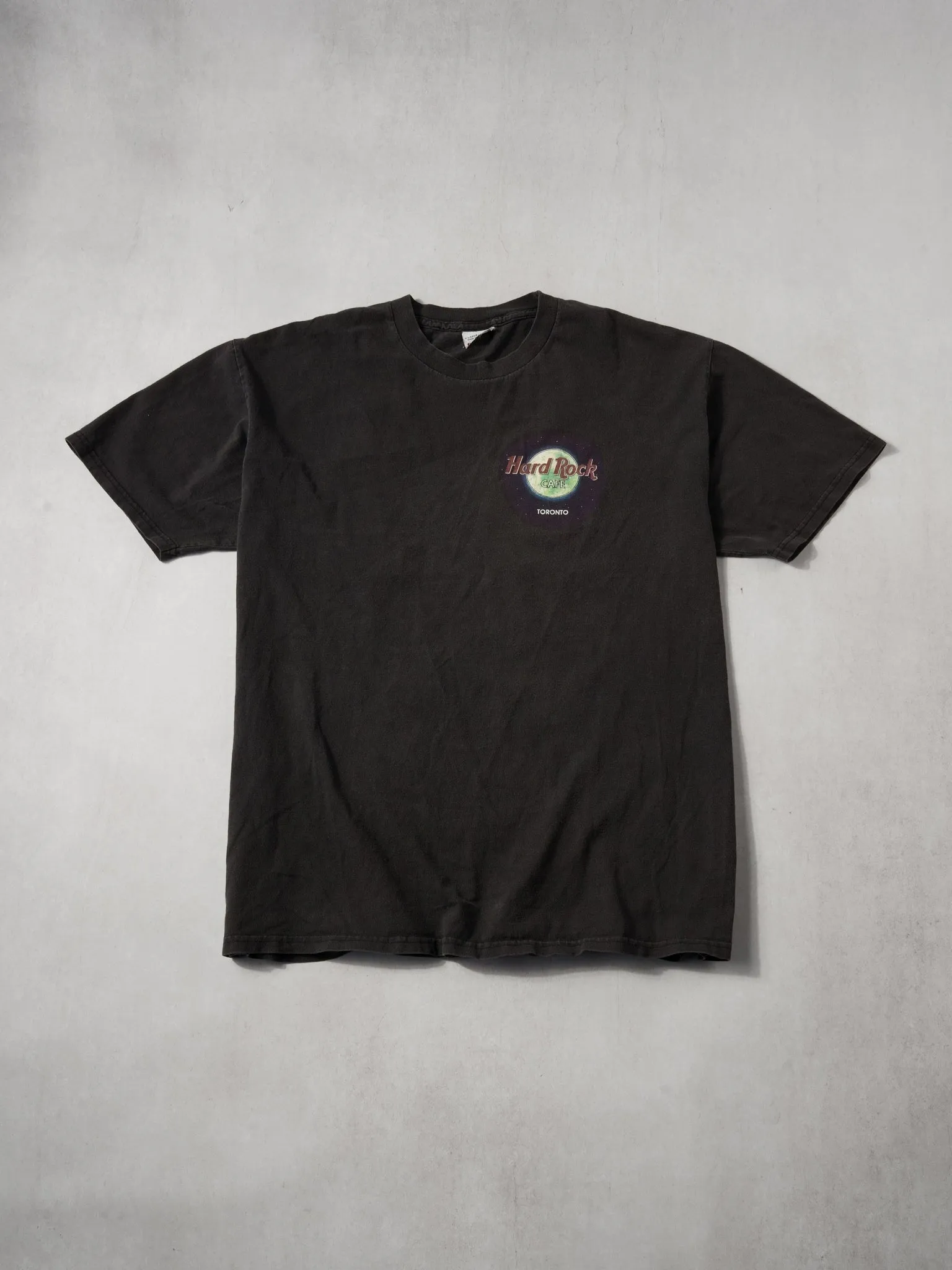 Vintage 90s Washed Black Hard Rock Cafe Toronto Tee (L) sold by Rebalance Vintage