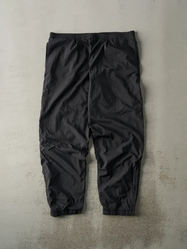 Vintage 90s Black Tonal Embroidered Nike Swoosh Track Pants (38x30.5) sold by Rebalance Vintage