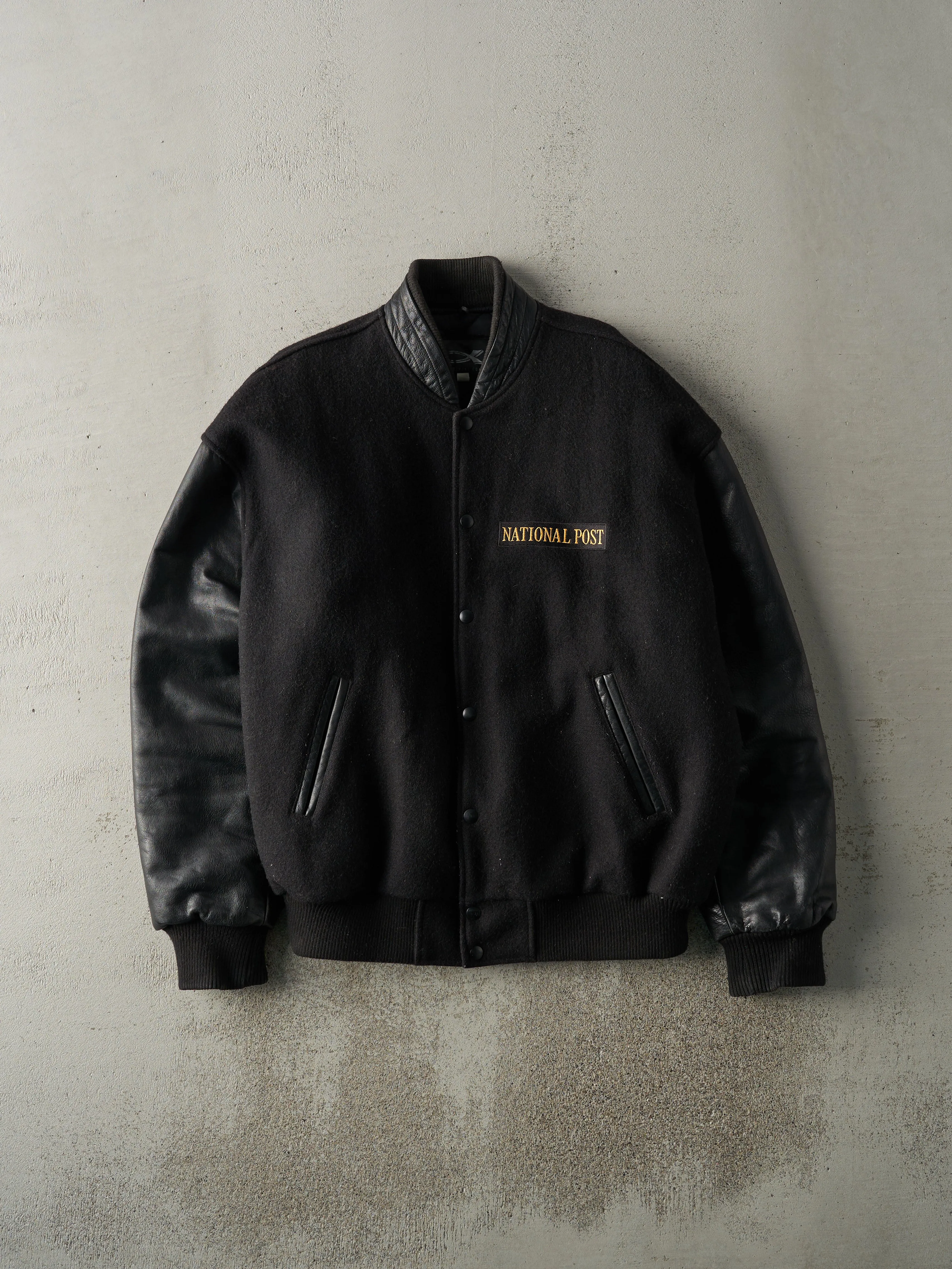 Vintage 90s Black National Post Wool Leather Varsity Jacket (L) sold by Rebalance Vintage