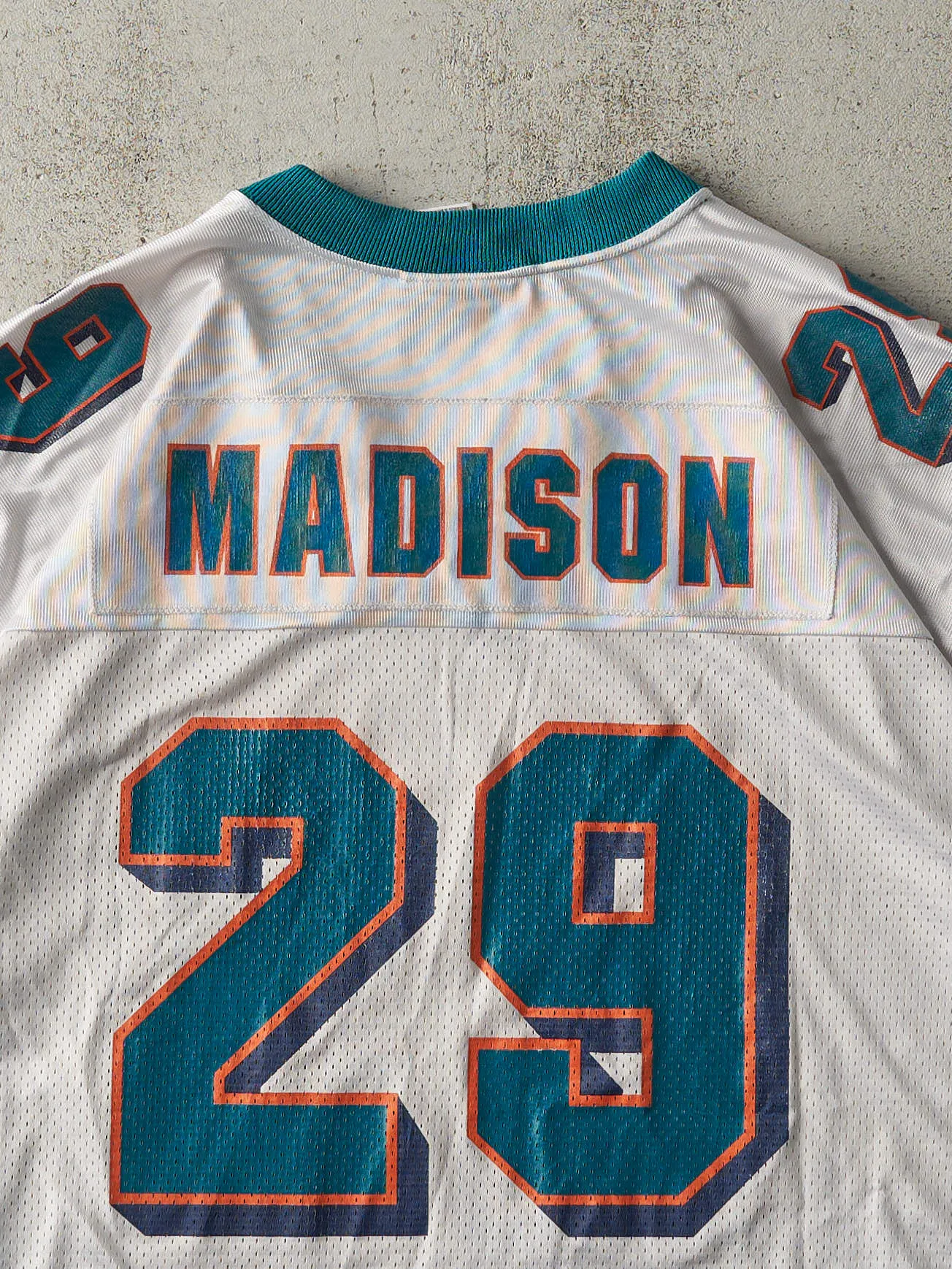 Vintage Y2K White & Teal Puma Miami Dolphins #29 Sam Maddison Cropped Jersey (L) sold by Rebalance Vintage product image thumbnail 4